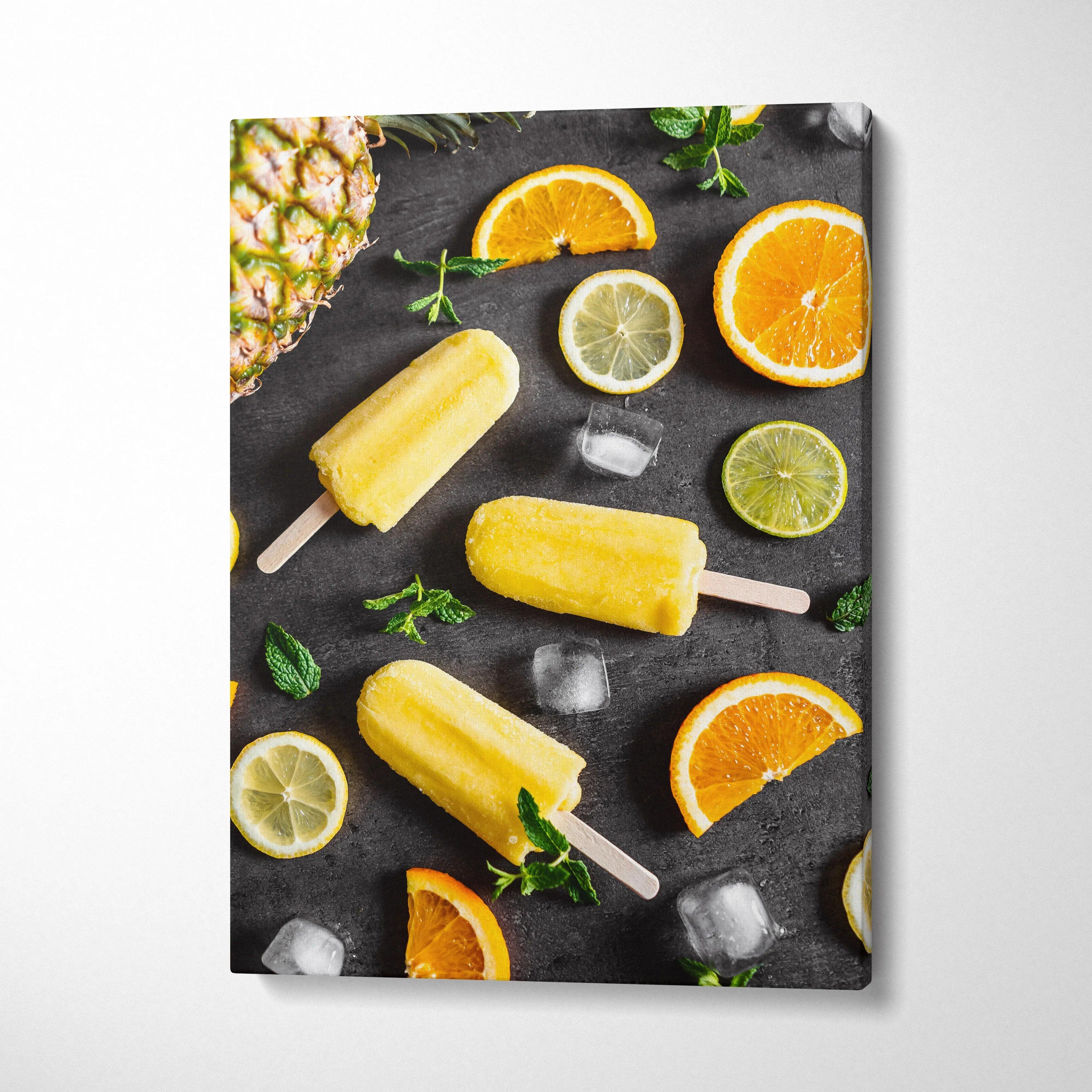 Bright lemon and lime popsicles with citrus slices and mint on black canvas wall art decor.