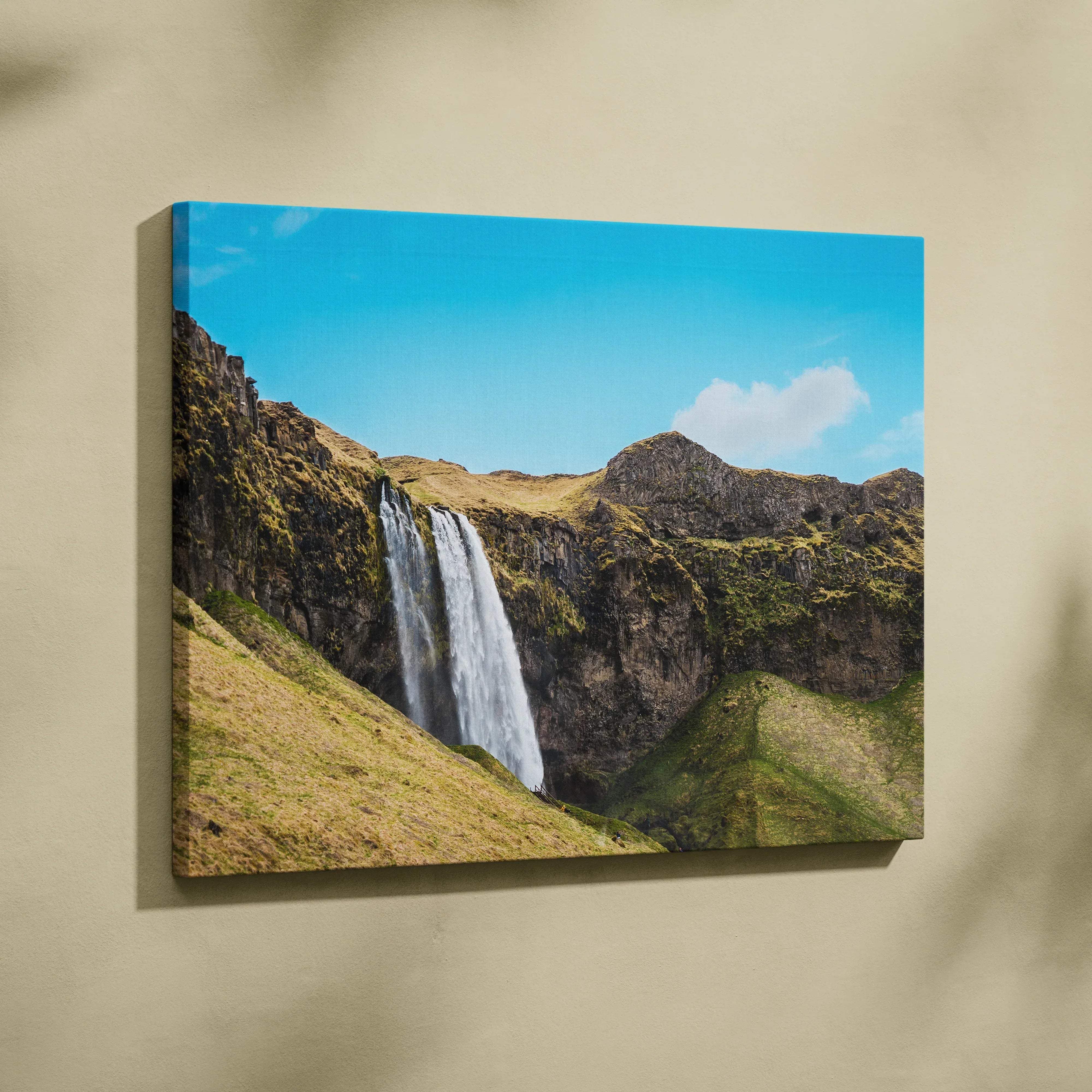 Icelandic waterfall landscape canvas wall art with vibrant blue sky and moss-covered cliffs for living room decor