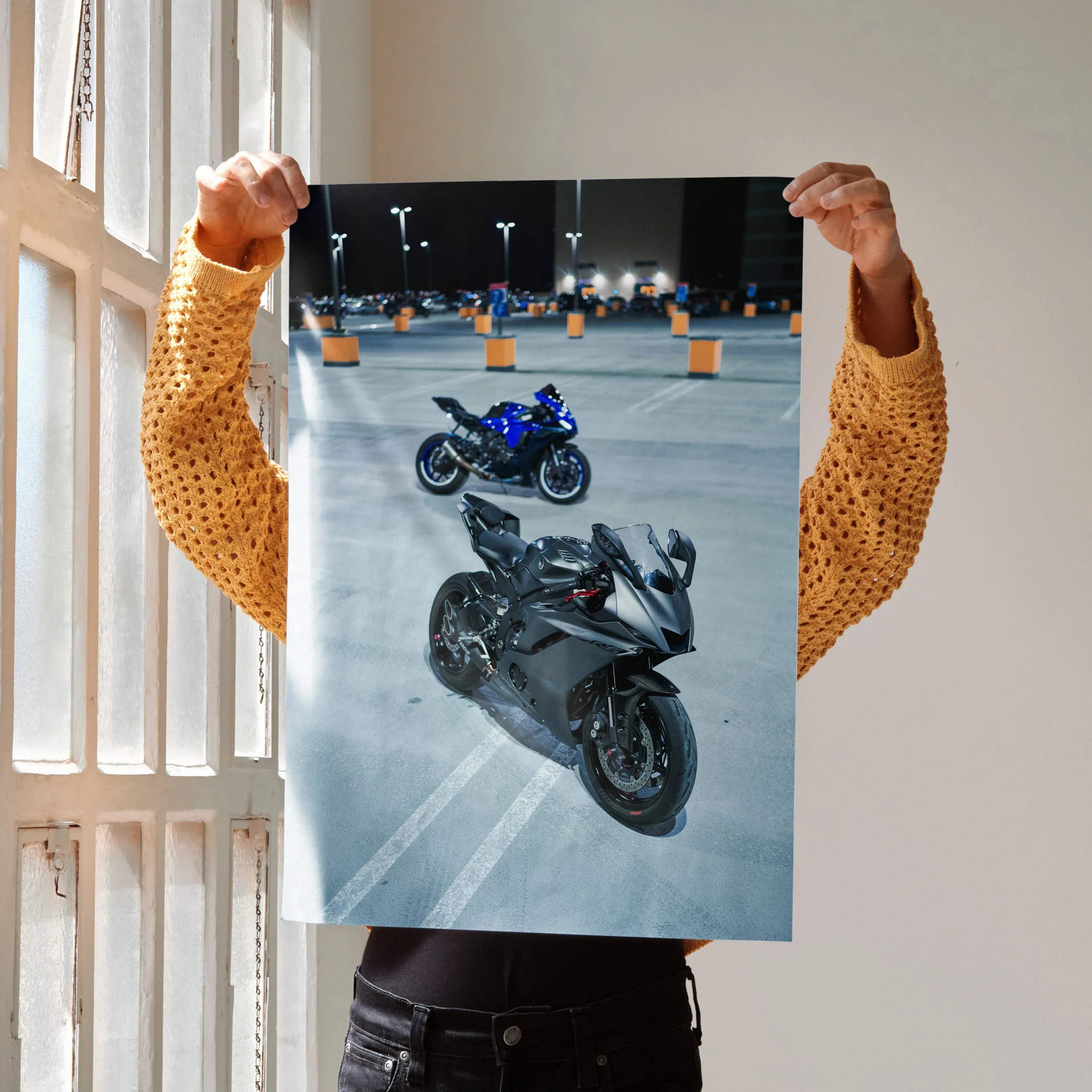 A framed Yamaha R1 and R6 motorcycle art print featuring glossy blue and matte black bikes at a nighttime parking lot