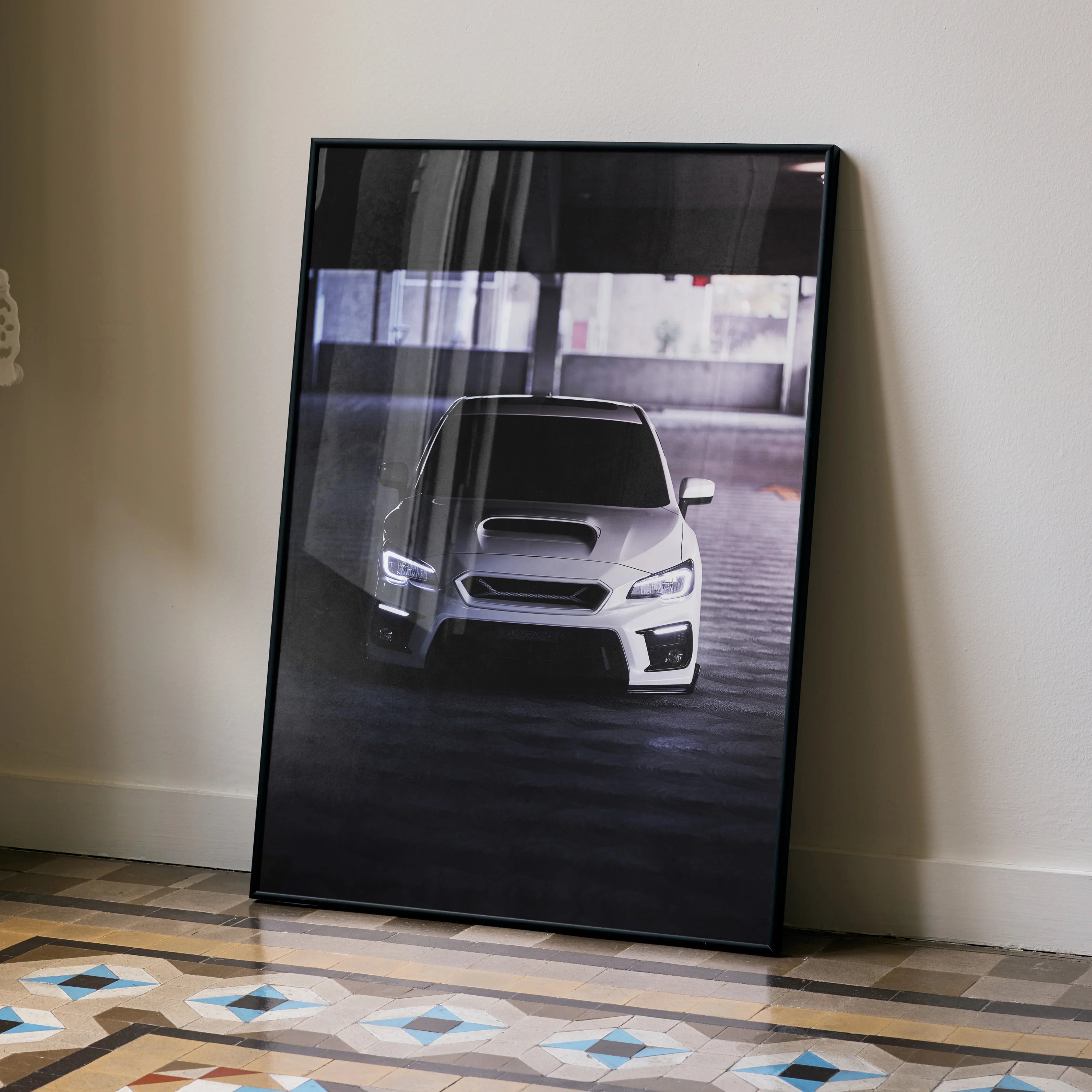 Subaru WRX front view poster with dark, moody garage background wall art.