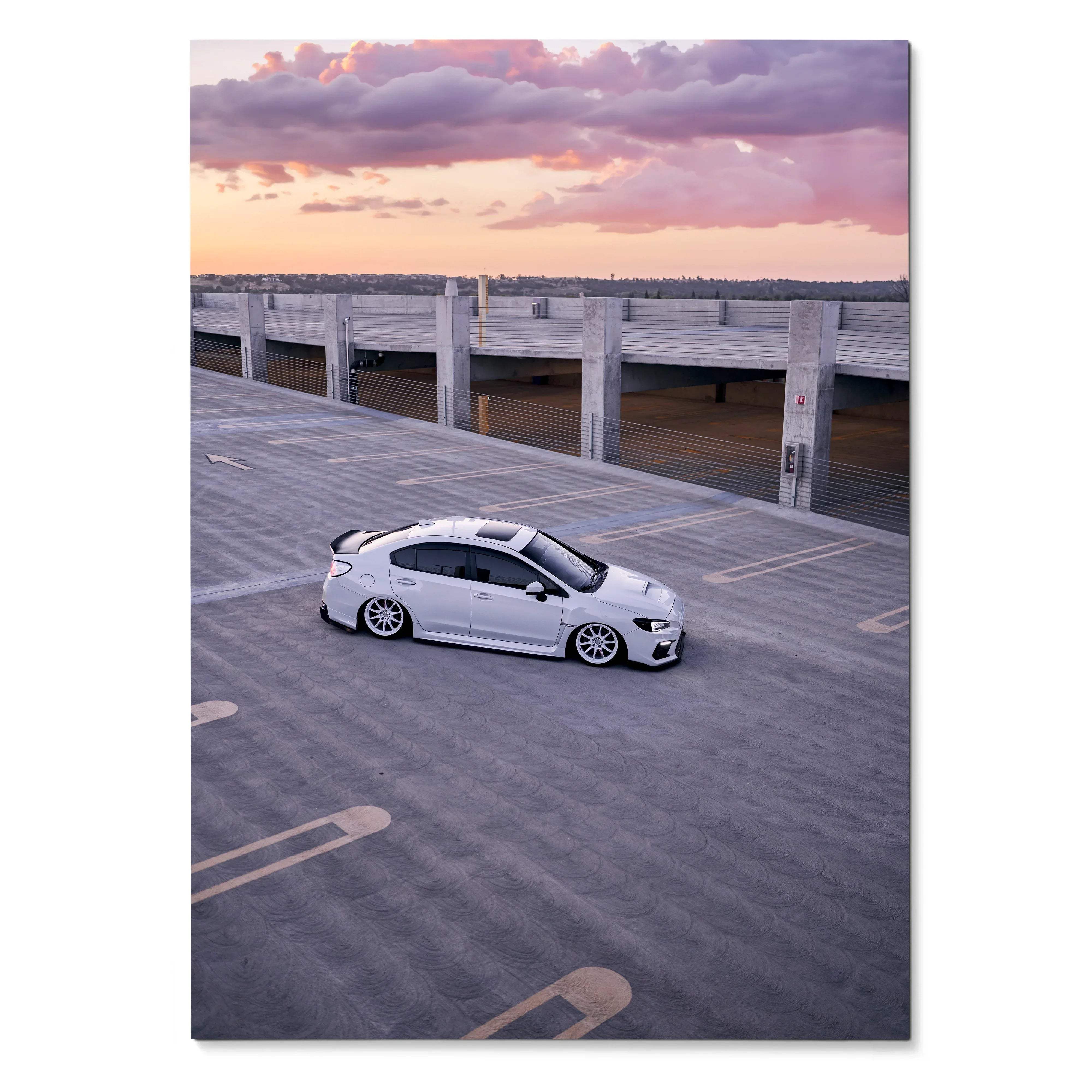 Subaru WRX parked on rooftop at sunset with vibrant sky poster wall art.
