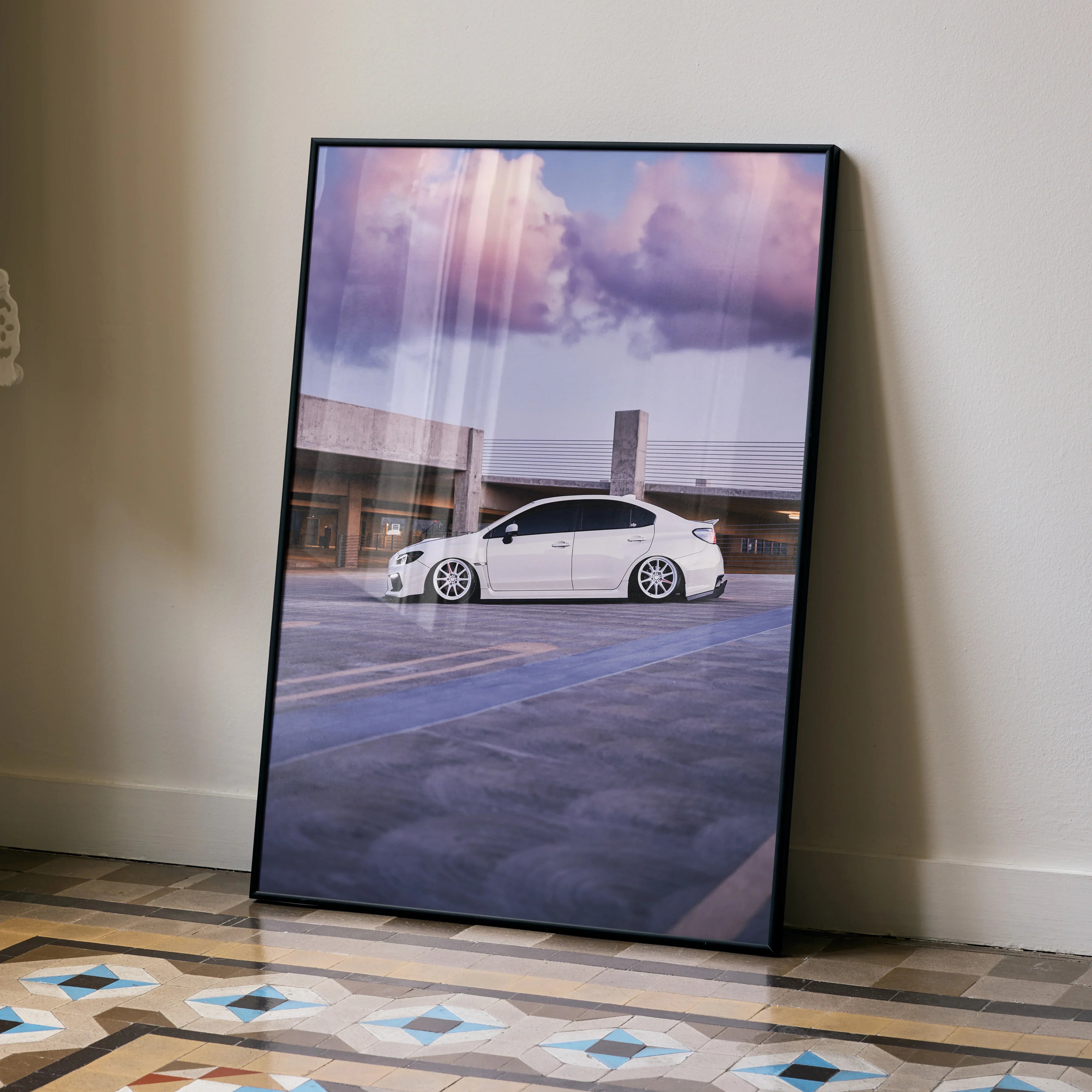 Framed Subaru WRX poster wall art with white car and purple sunset sky background.