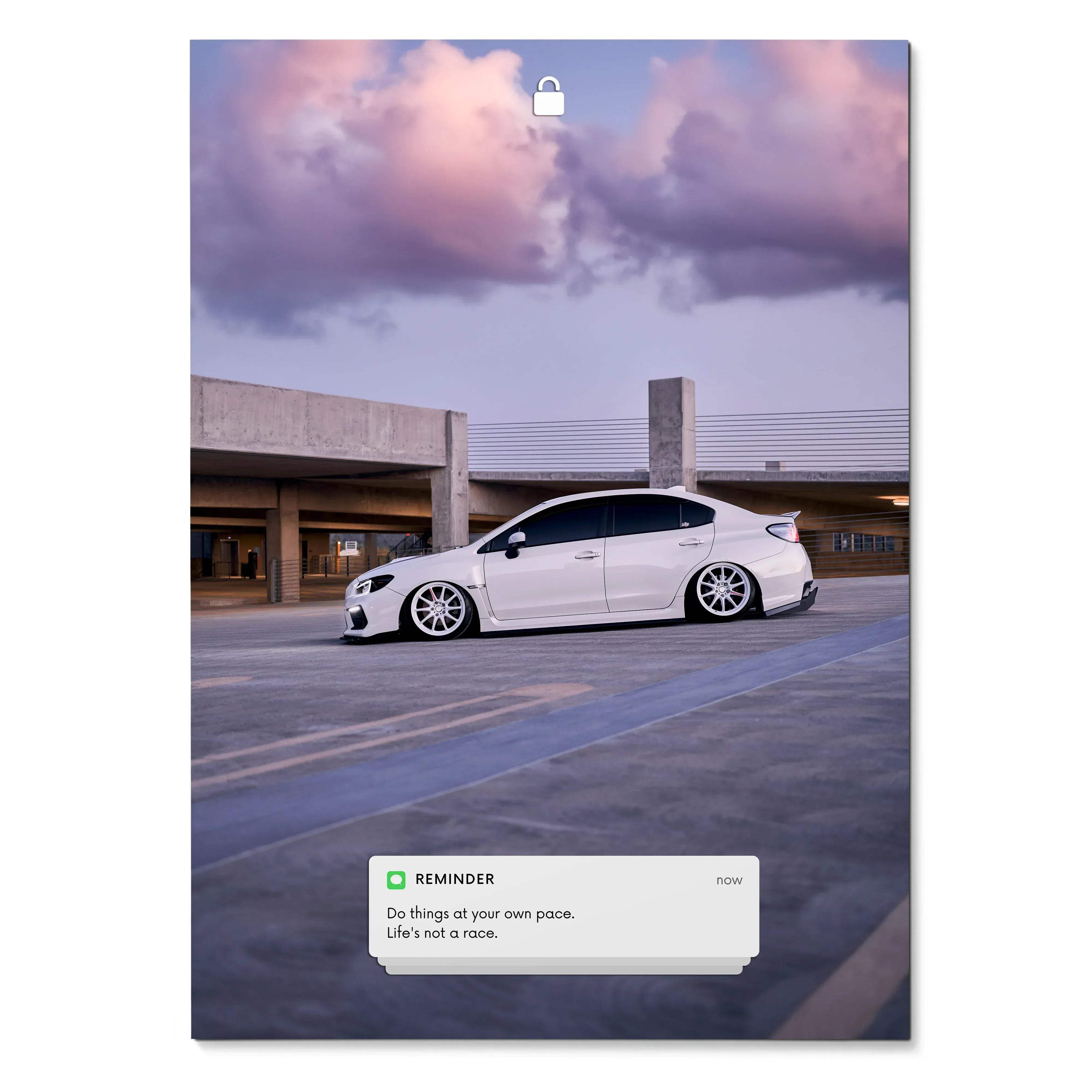 Subaru WRX parked under colorful evening sky with motivational text poster wall art.