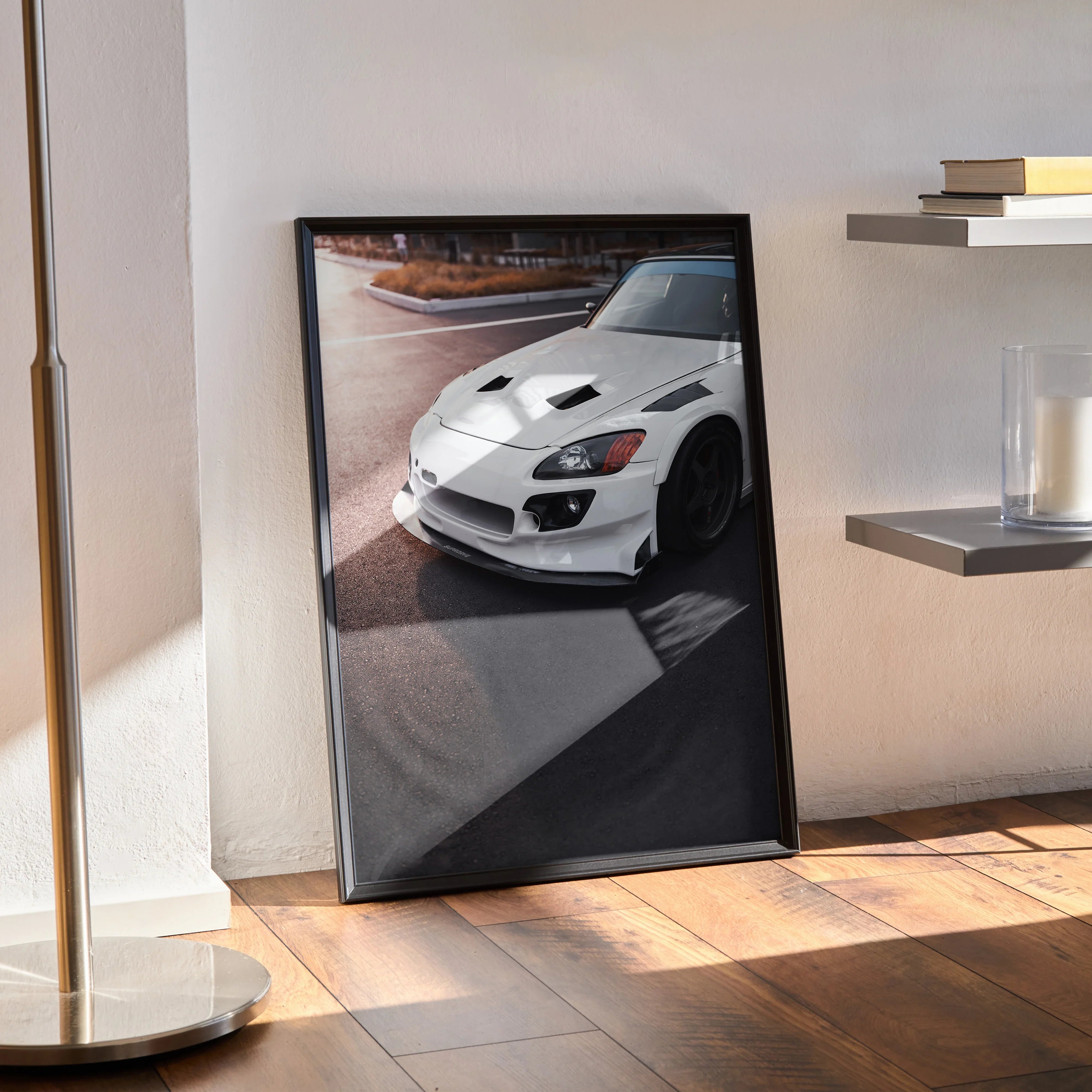 Honda S2000 white sports car poster leaning against wall, high-resolution automotive wall art in black frame.