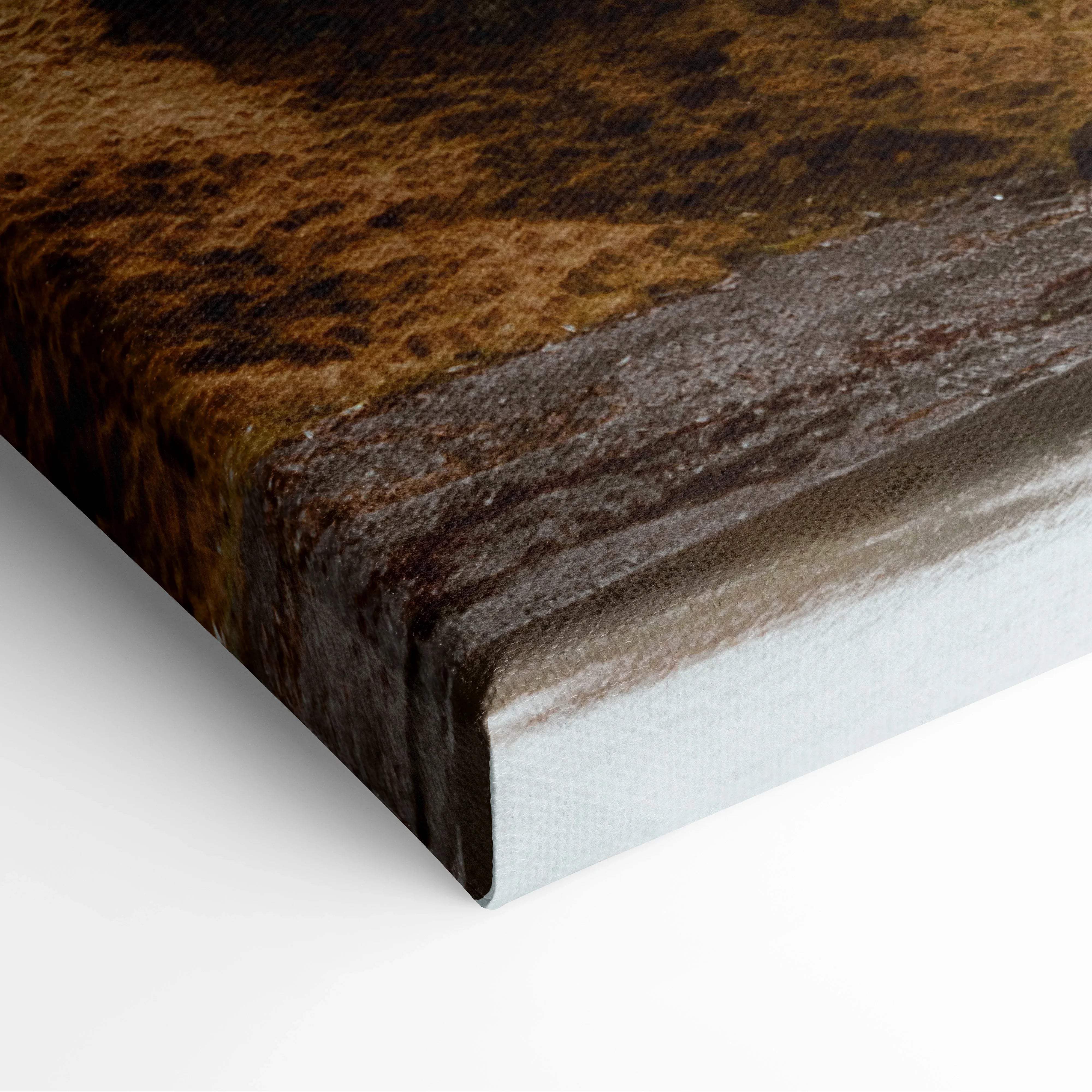 Canvas print of Nordic Icelandic snowy mountain coastline in serene blue tones on textured earthy brown rust surface