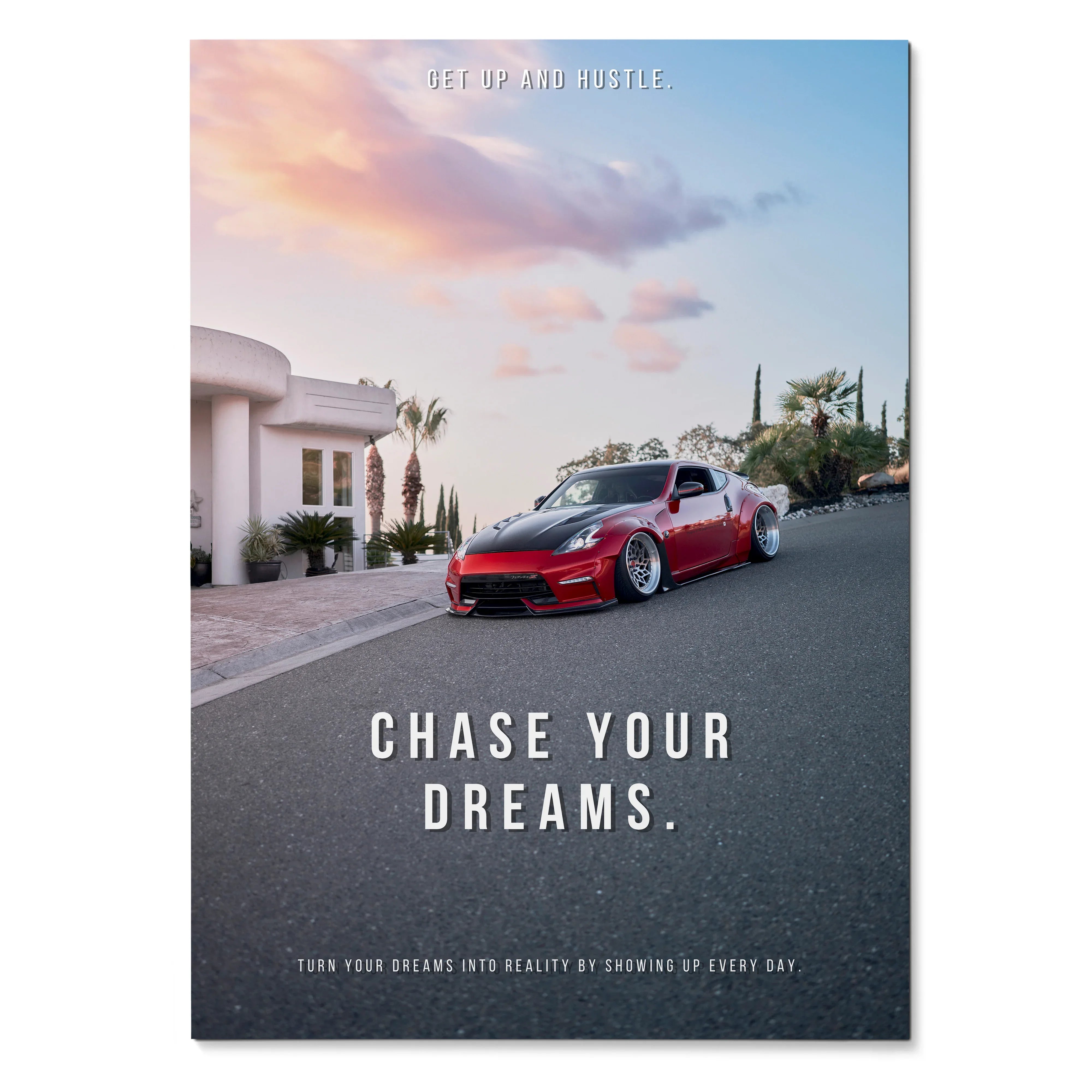 Motivational poster wall art featuring a red Nissan 370z with "Chase Your Dreams" text against a sunset sky.