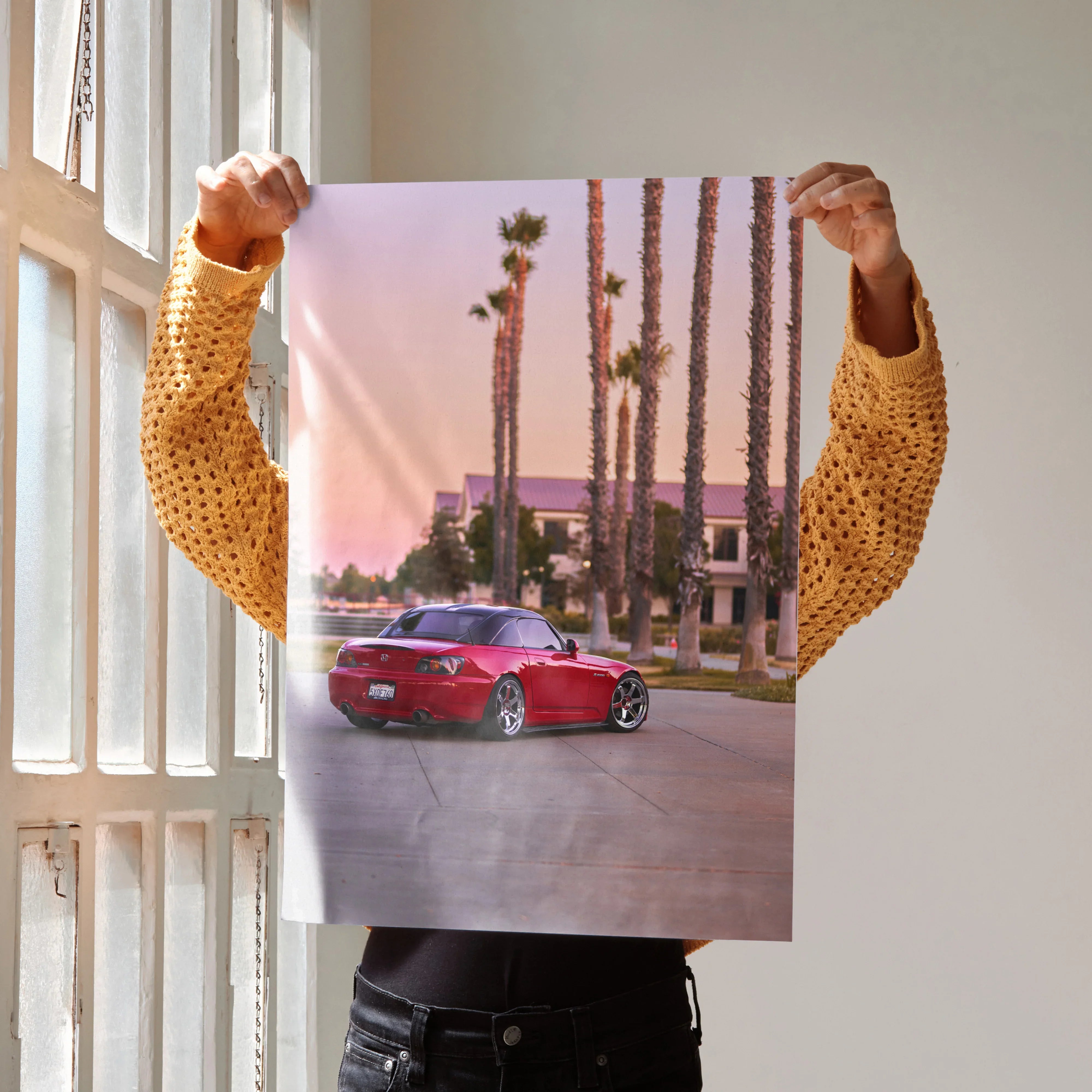 Red Honda S2000 parked by palm trees at sunset Poster Wall Art print.