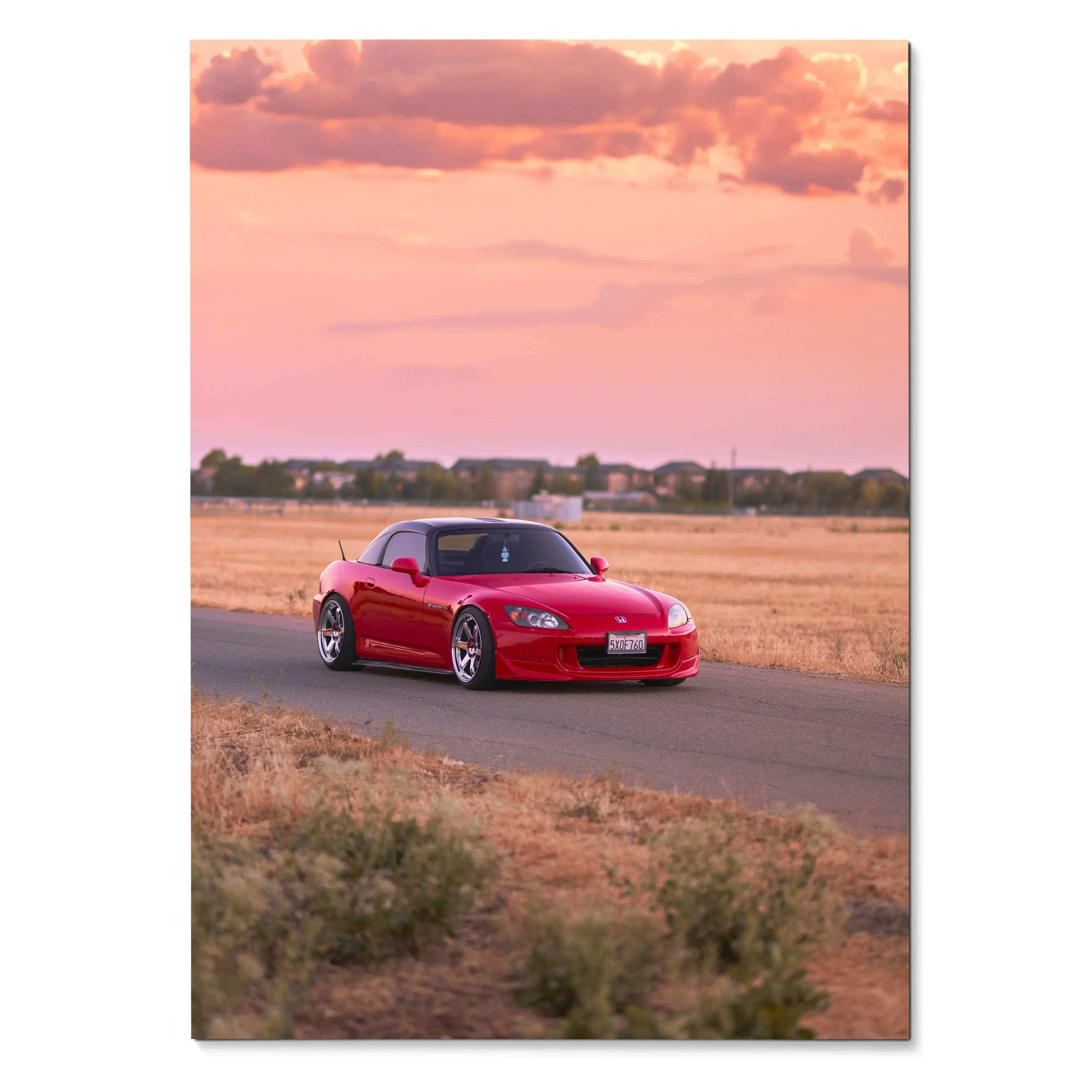 Honda S2000 sports car in red driving on rural road at sunset poster wall art.
