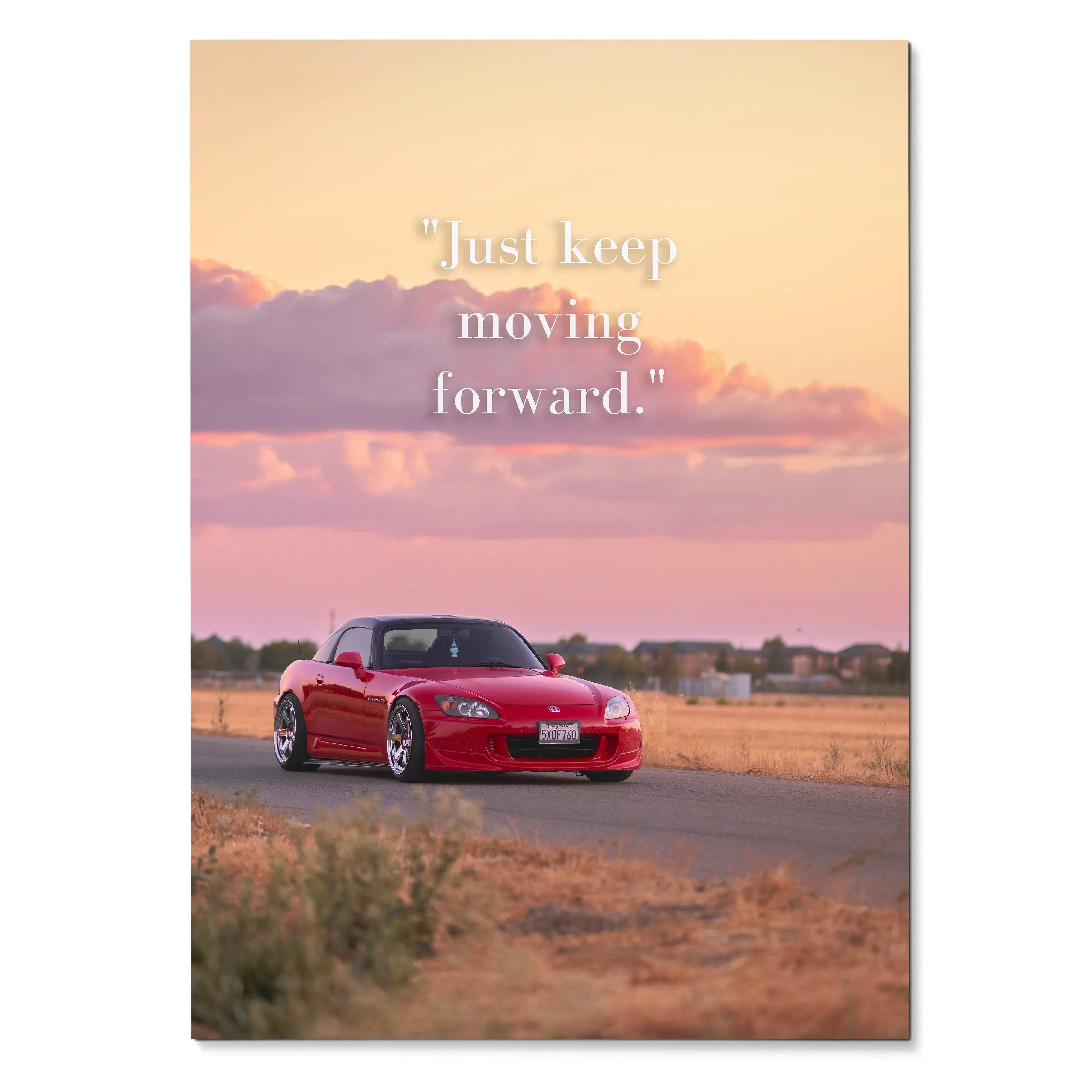 Motivational poster featuring a red honda s2000 sports car with sleek aerodynamic design and black roof