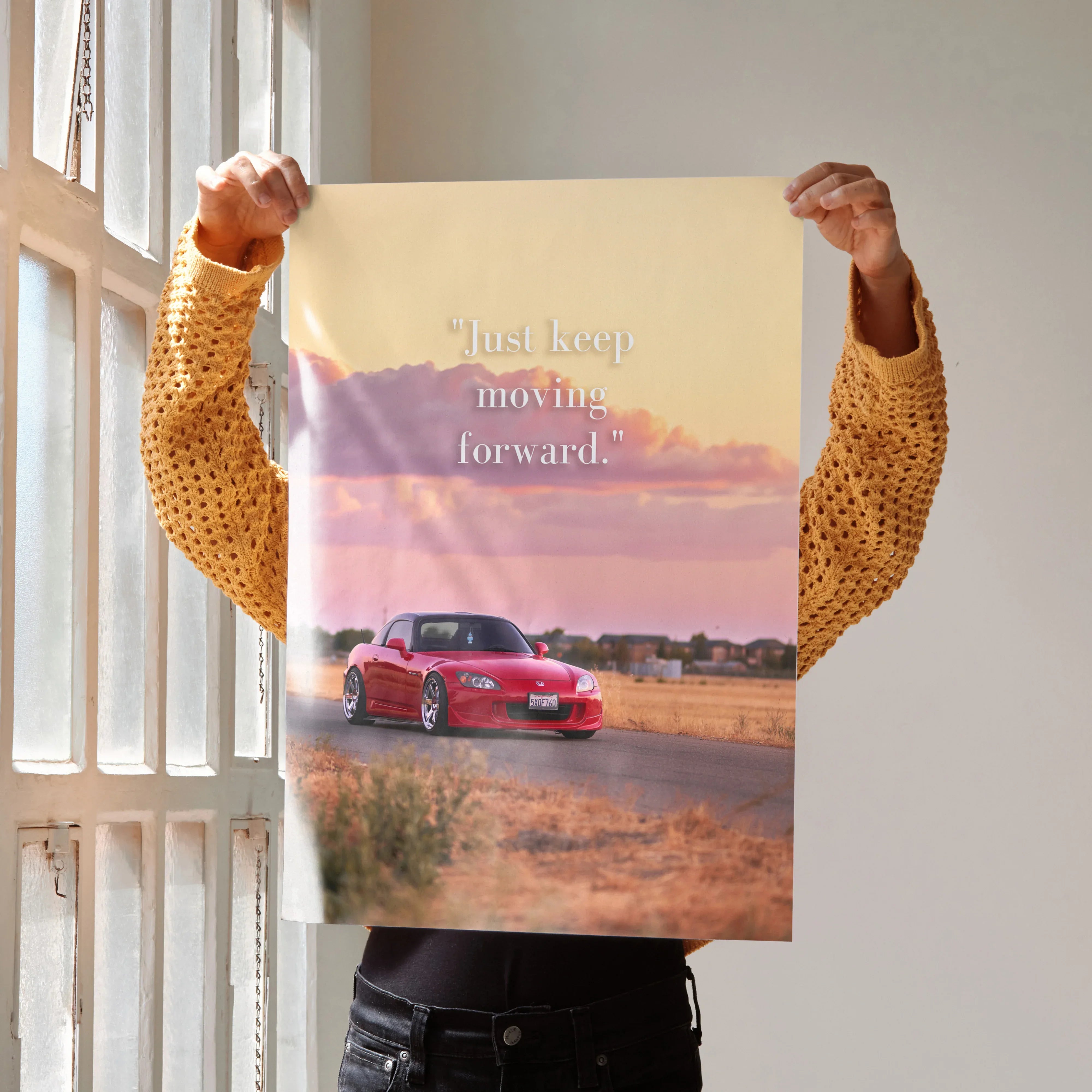 Poster featuring a red Honda S2000 on a sunset road with motivational text, wall art design.