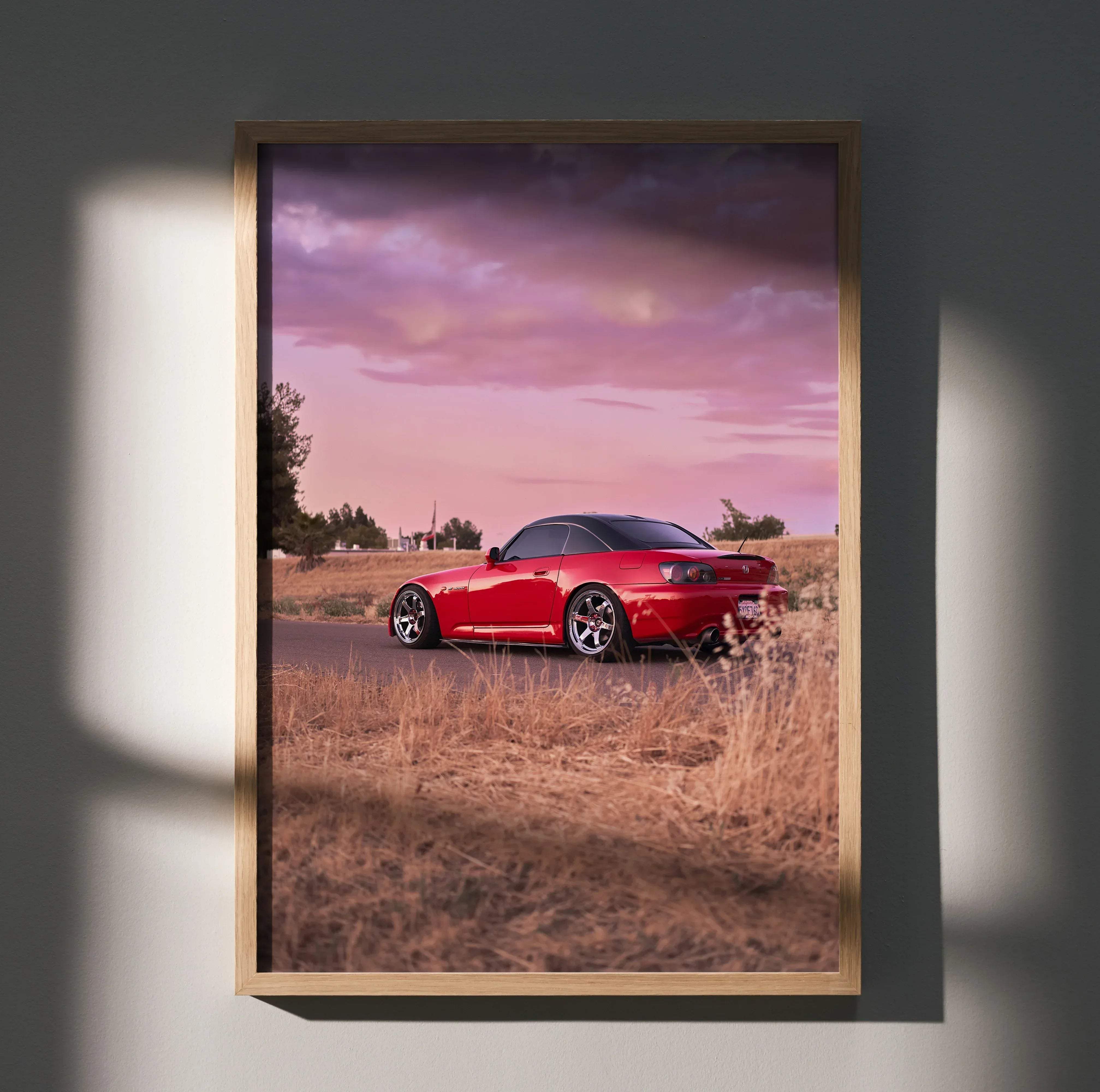 Red honda s2000 sports car high resolution poster in a light wood frame for wall decoration