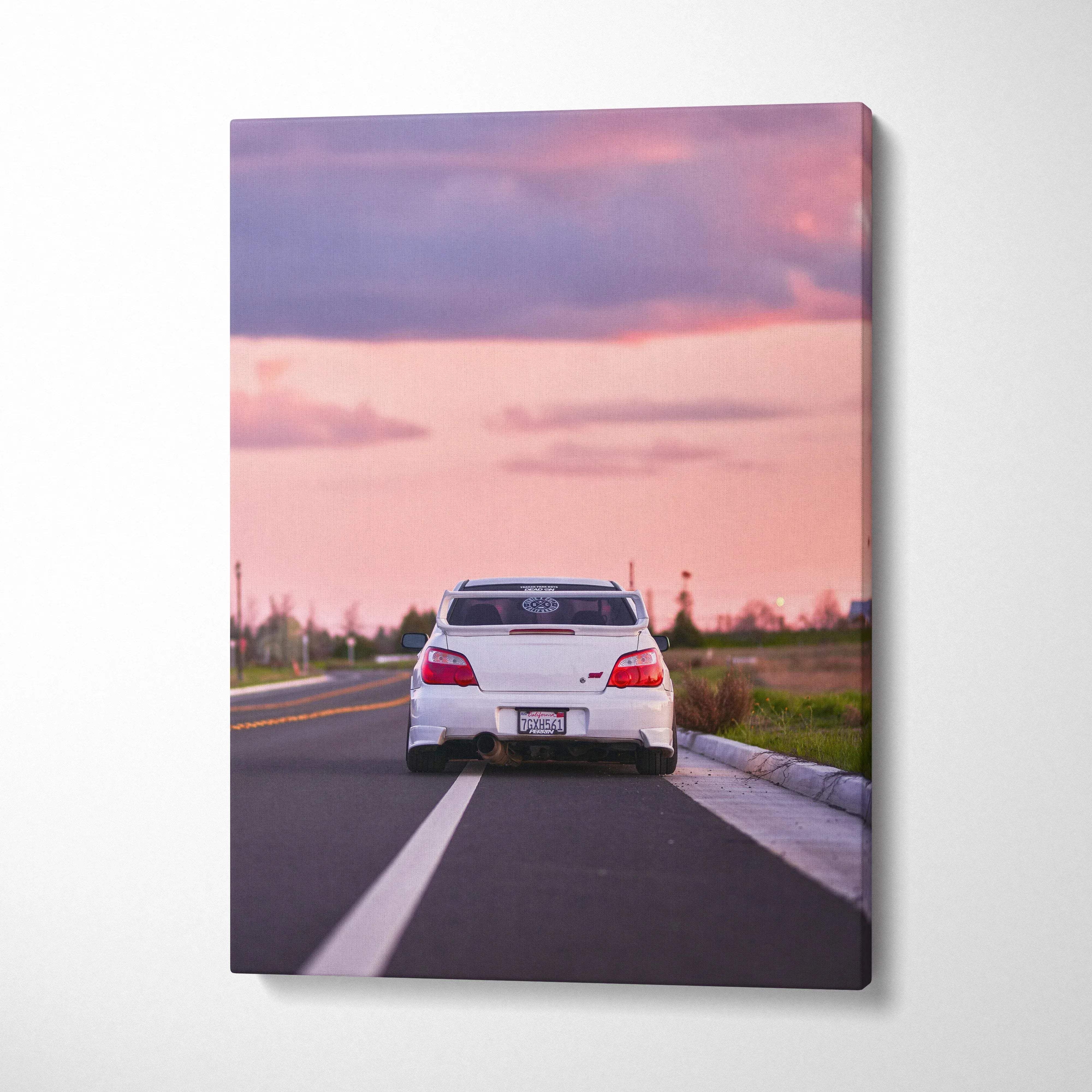 Vertical Subaru WRX STI car canvas wall art with sunset sky background.