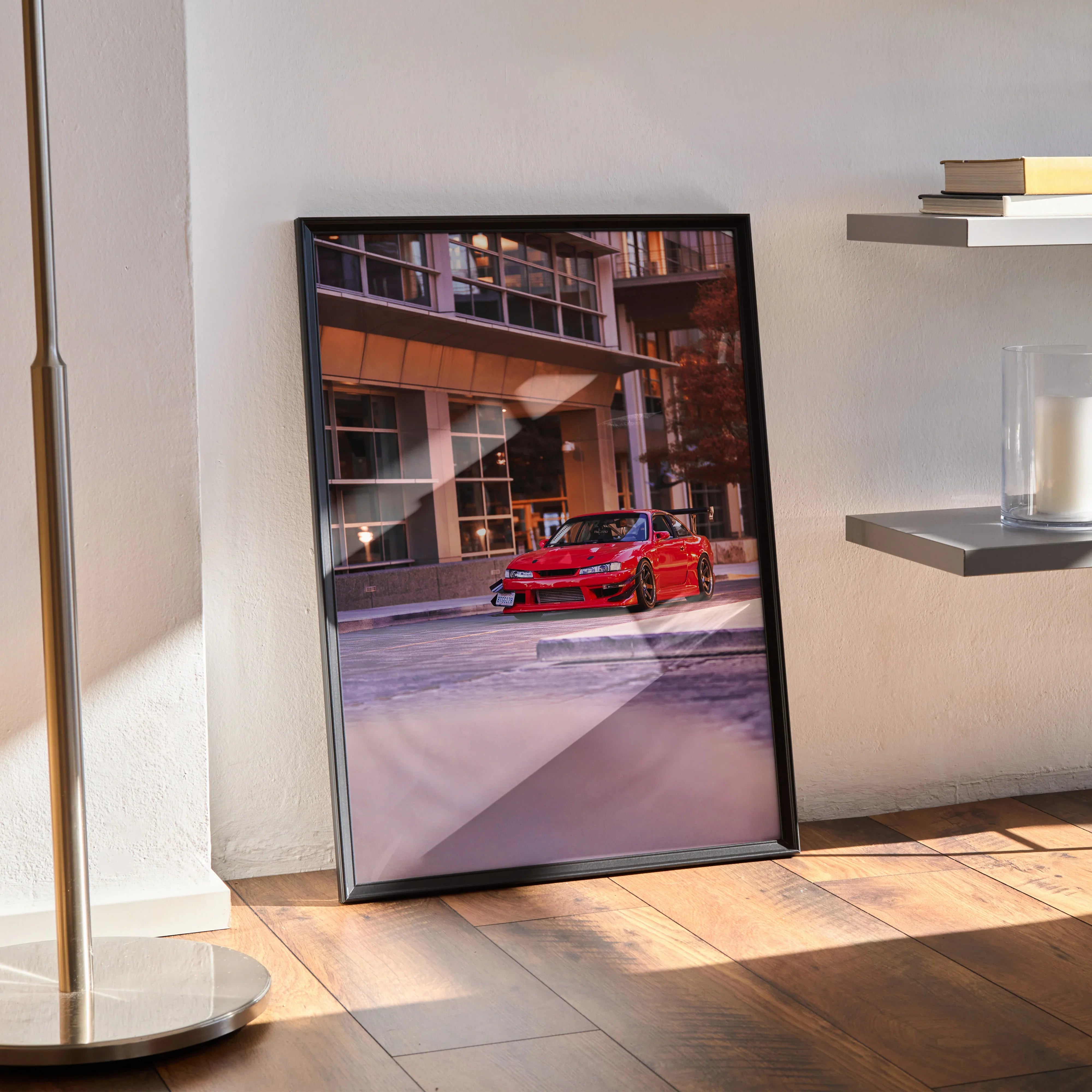Nissan 240sx S14 Kouki red car Poster wall art in black frame leaning on floor.