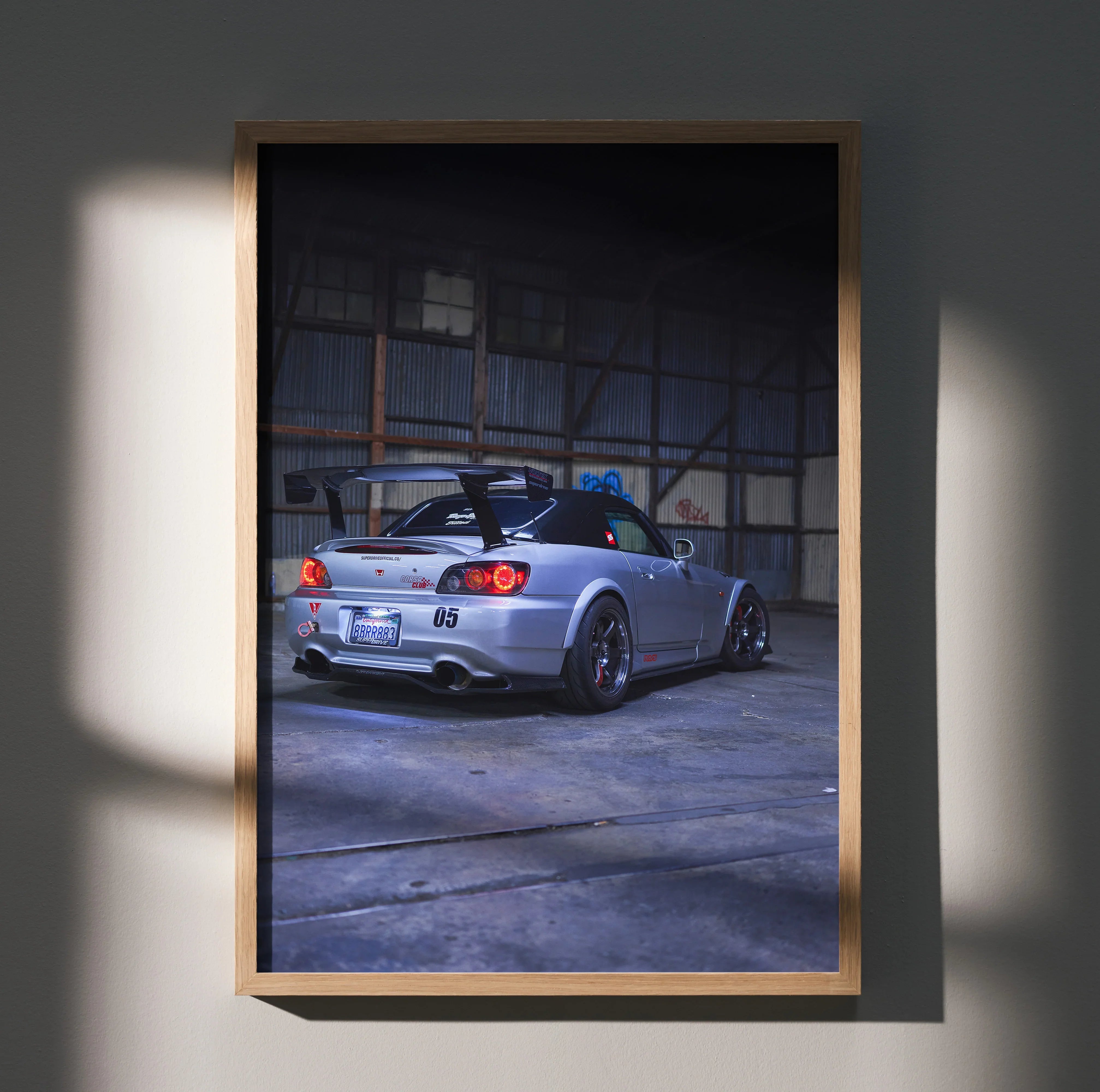 Honda S2000 silver sports car poster with dynamic rear view, urban garage wall art.