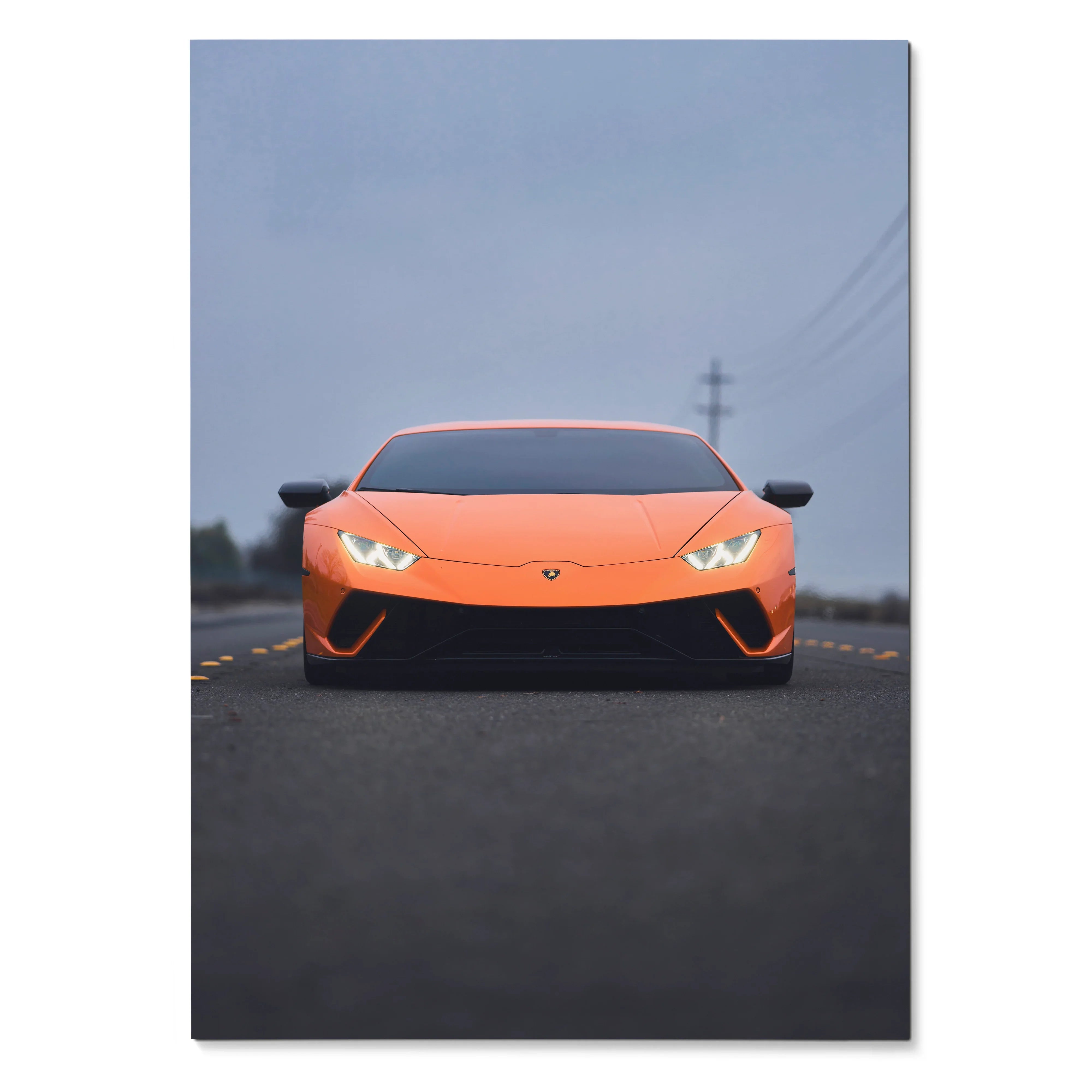 Orange Lamborghini Huracan front view on road at dusk poster wall art.