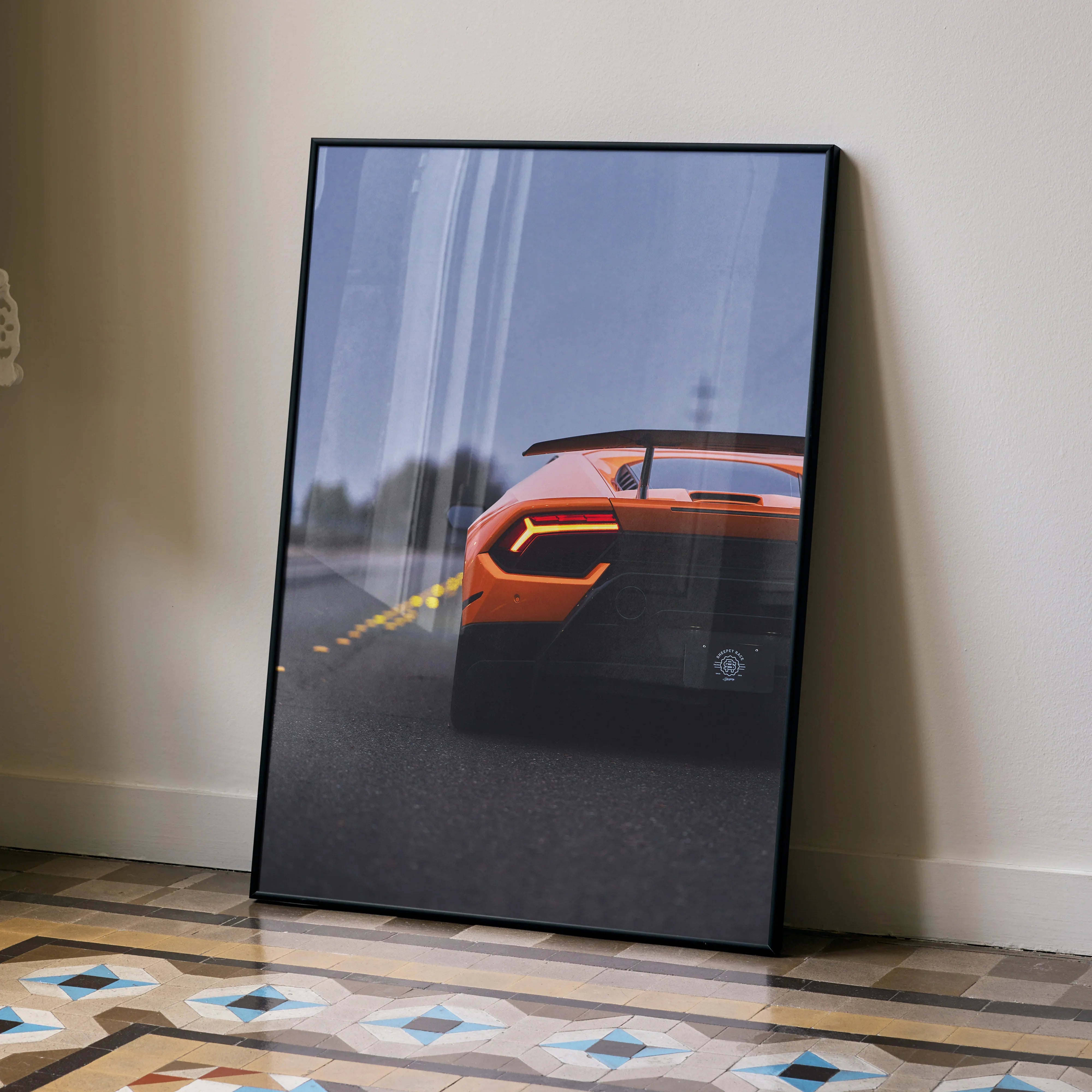 Lamborghini Huracan rear view poster with orange sports car and rear wing wall art.