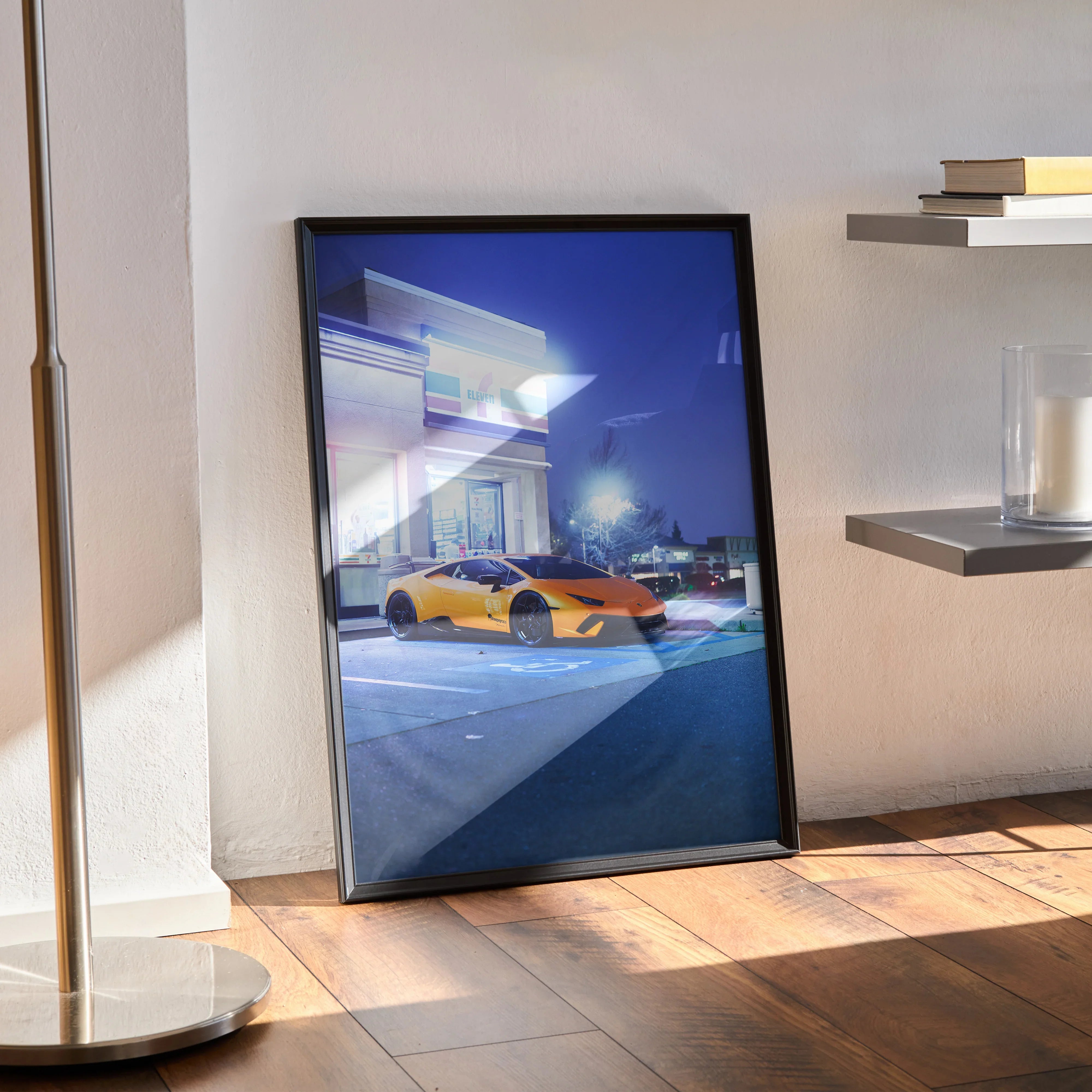 Lamborghini Huracan poster wall art with vivid orange sports car under night sky in sleek black frame.