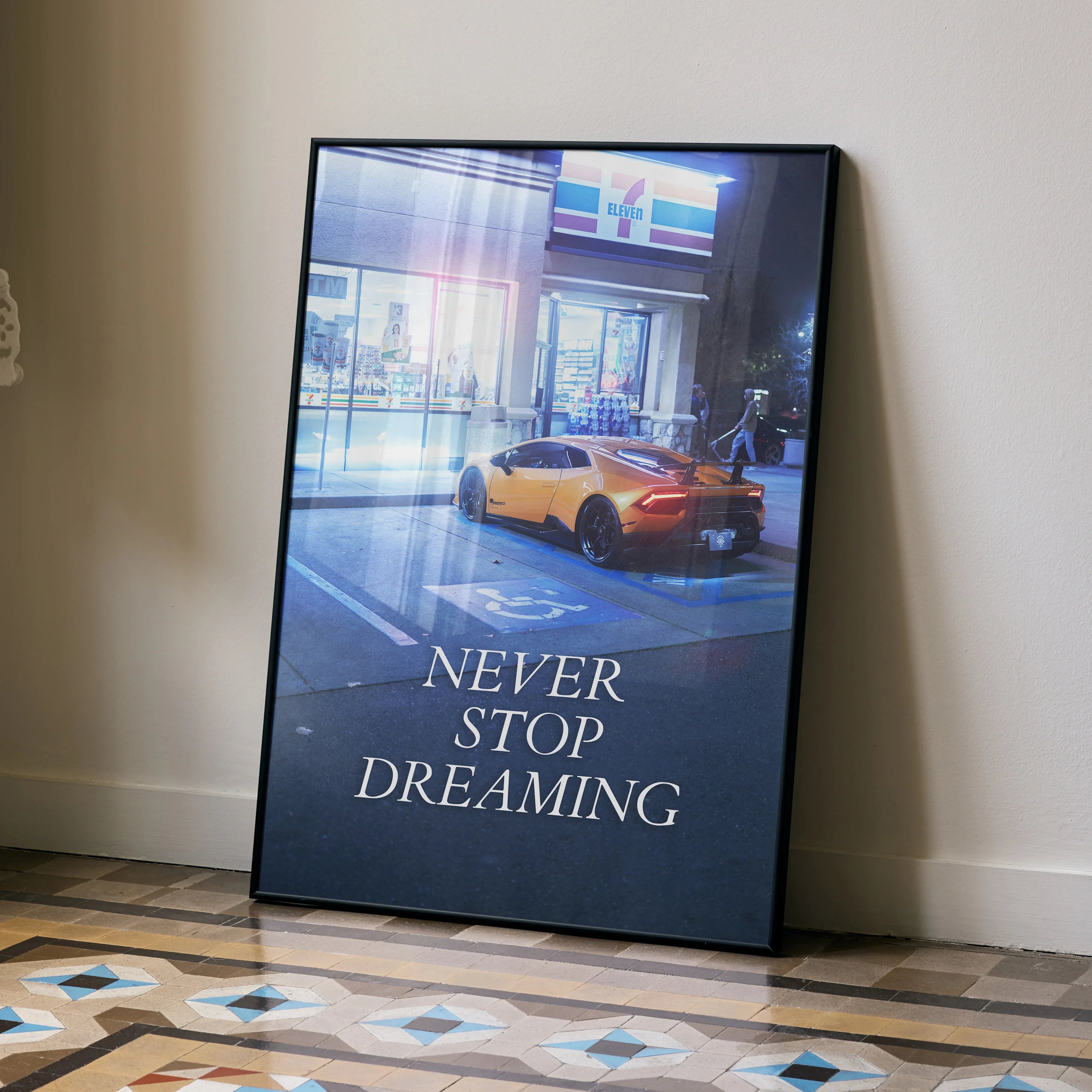 Motivational poster wall art featuring a yellow Lamborghini Huracan with "Never Stop Dreaming" text.