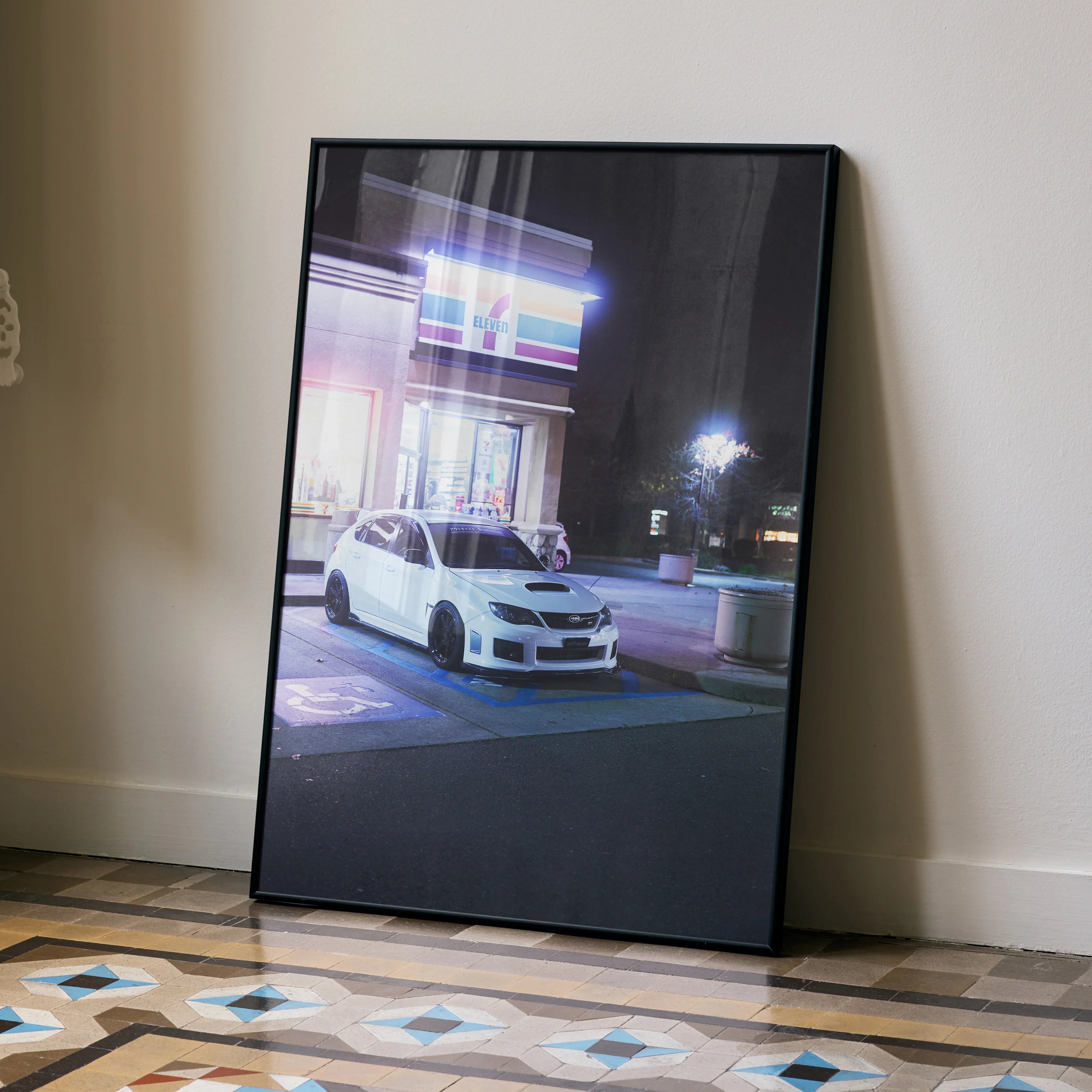Subaru WRX STI poster showcasing a white car parked at night in urban wall art decor.
