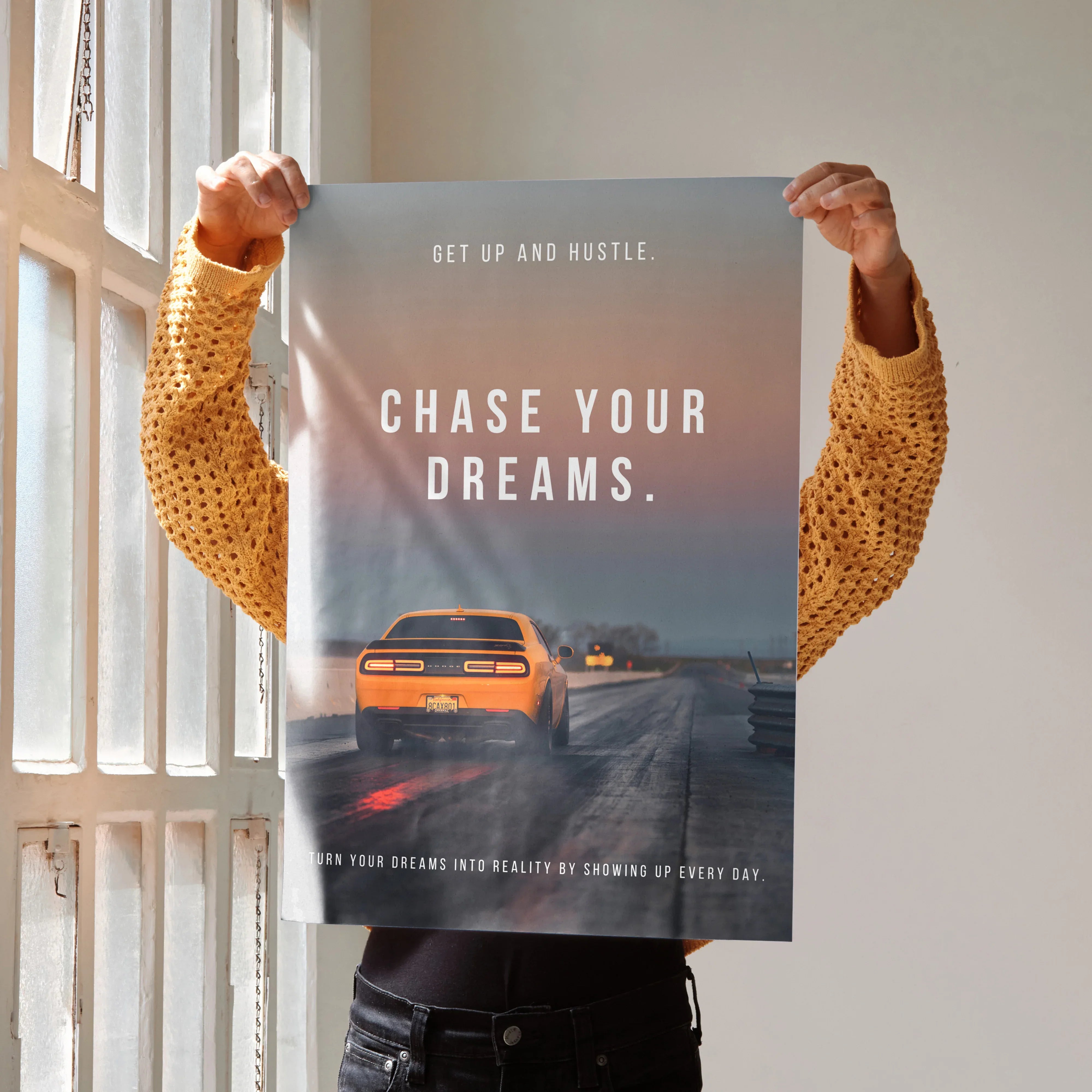 Motivational wall art poster featuring a Dodge Challenger with "Chase Your Dreams" inspiring text.