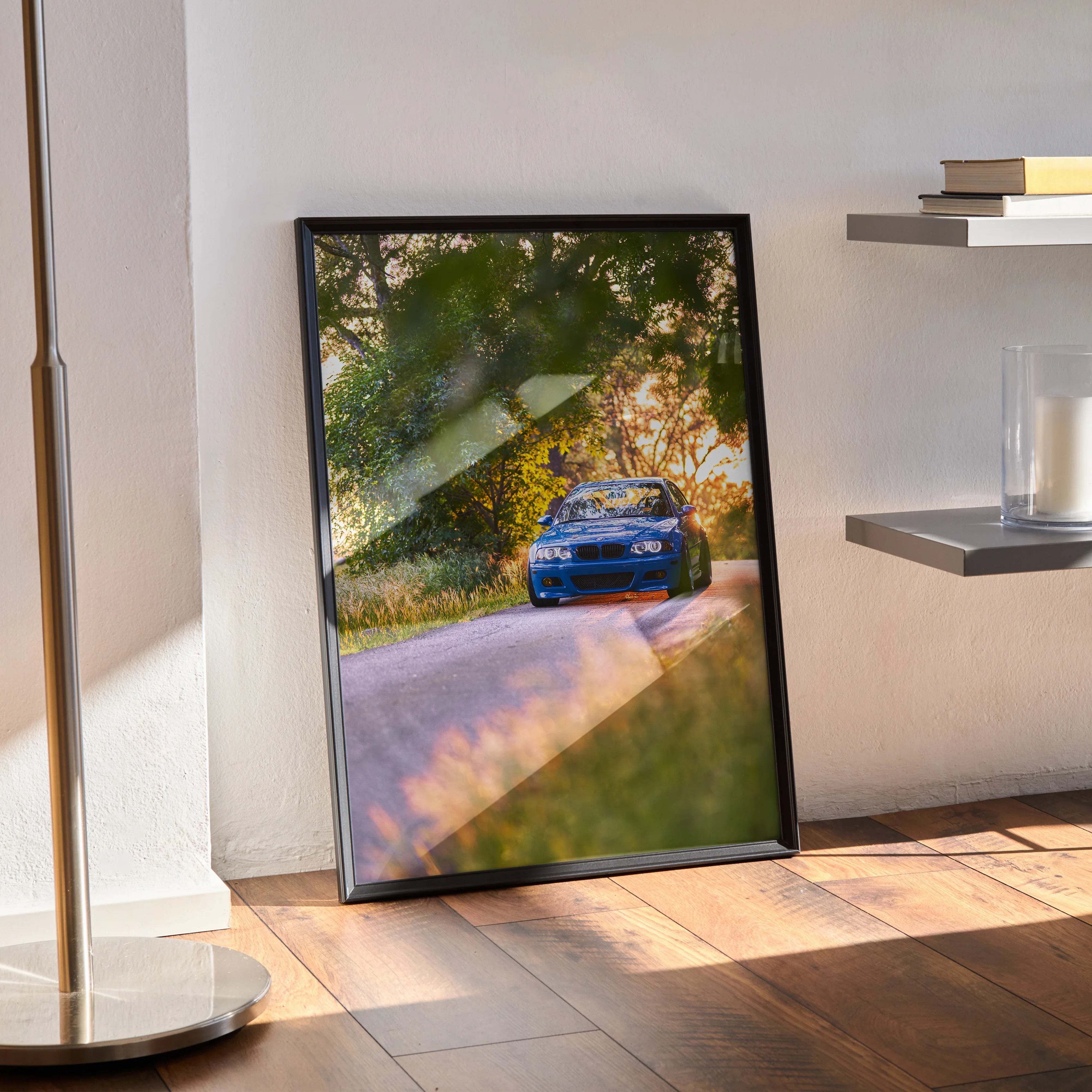 BMW E46 M3 poster with vibrant sunset background in sleek black frame, automotive wall art.