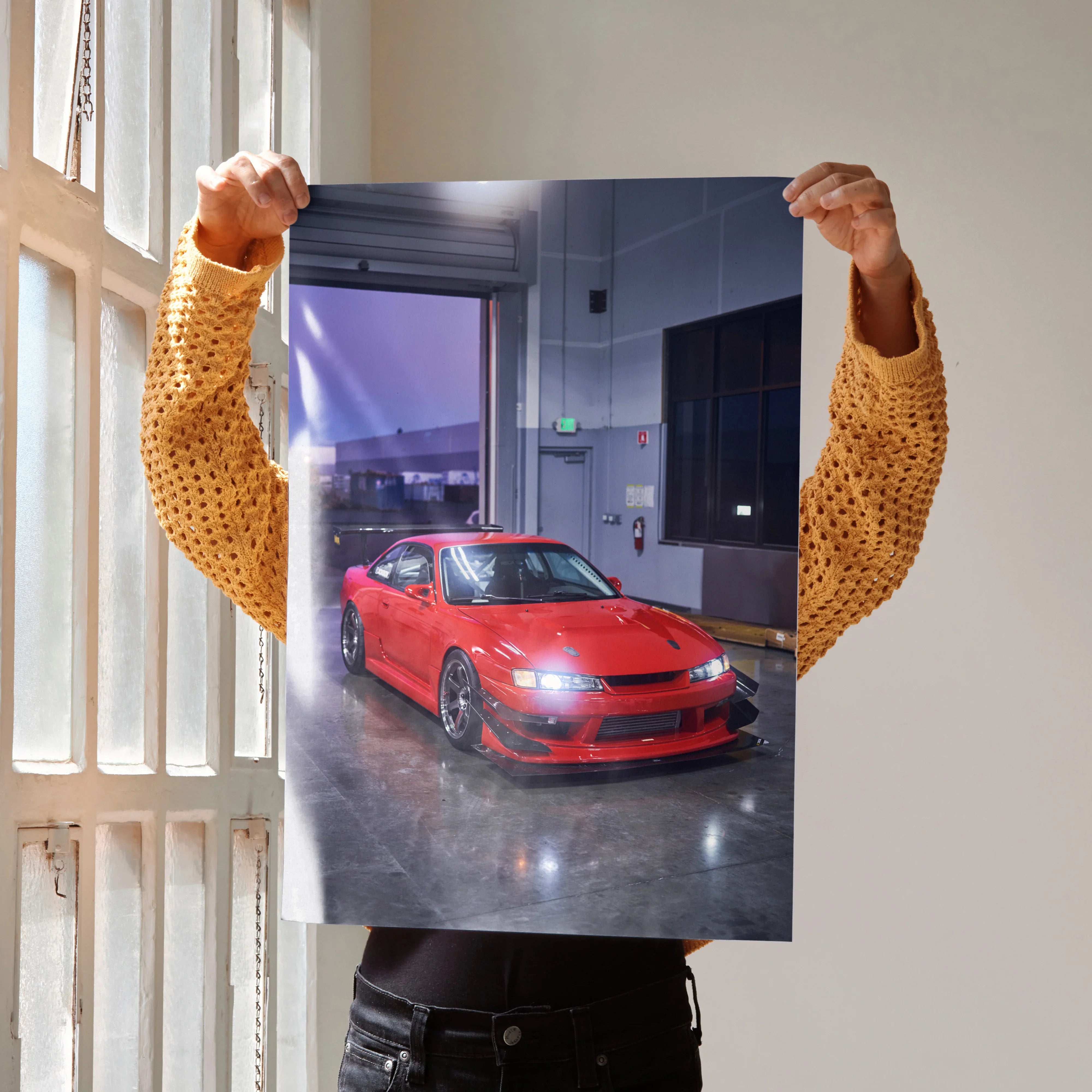 Red Nissan 240sx S14 Kouki poster showing car in modern garage setting, automotive wall art.