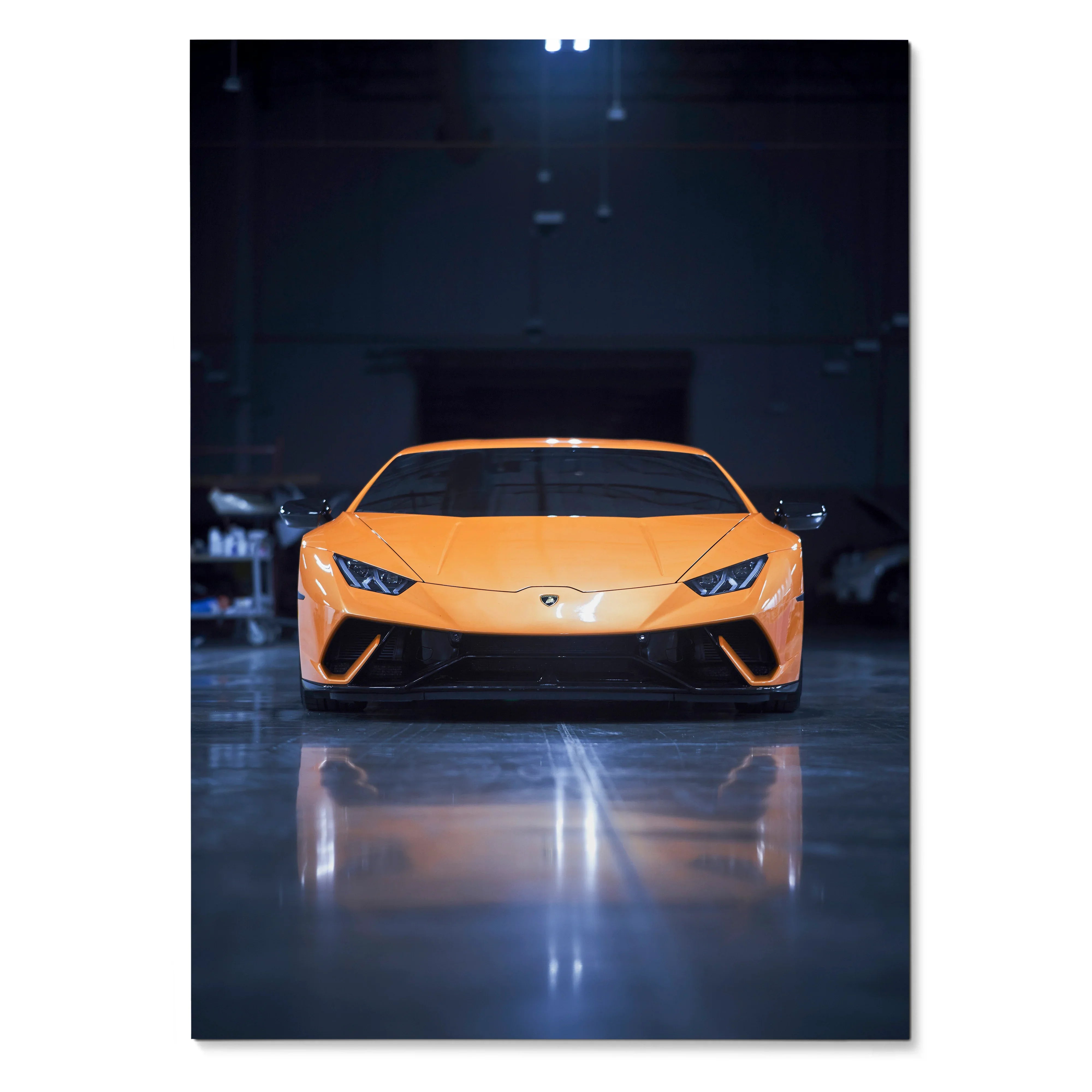 Lamborghini Huracan in bright orange front view poster with dark garage background wall art.