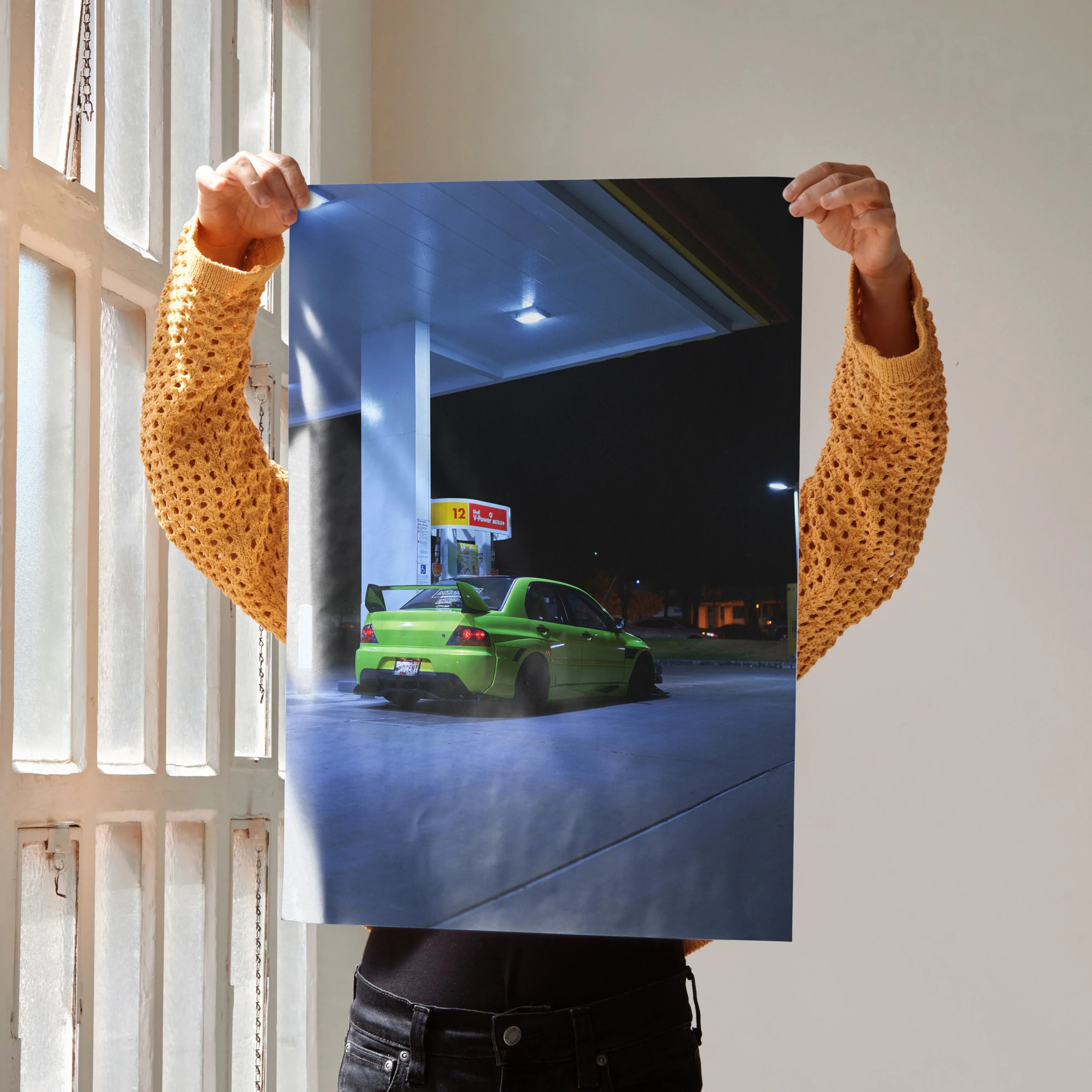 Mitsubishi Evo 9 in bright green at gas station at night poster wall art.