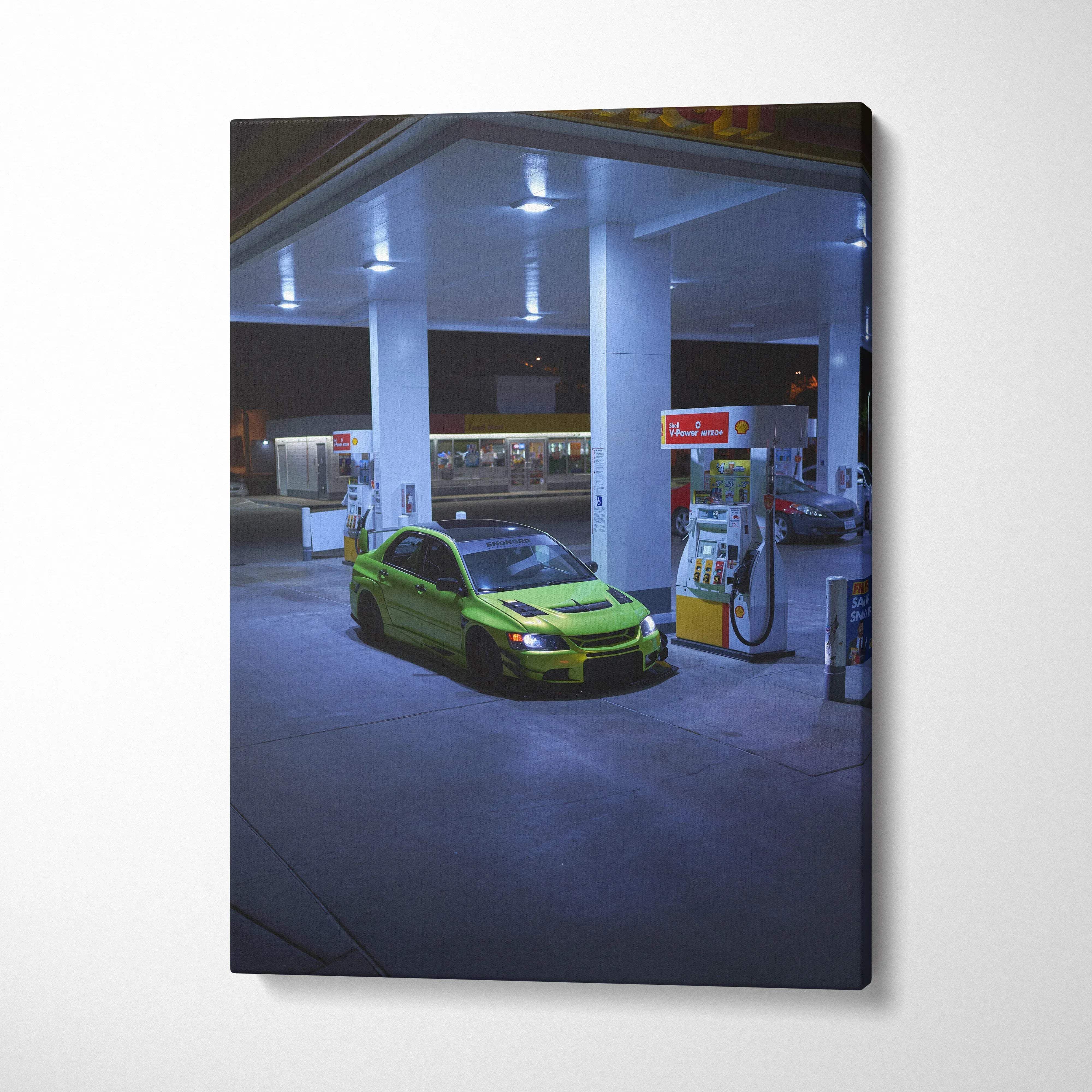 Vertical canvas art of a green Mitsubishi Evo 9 parked at a gas station at night, high-resolution wall art.