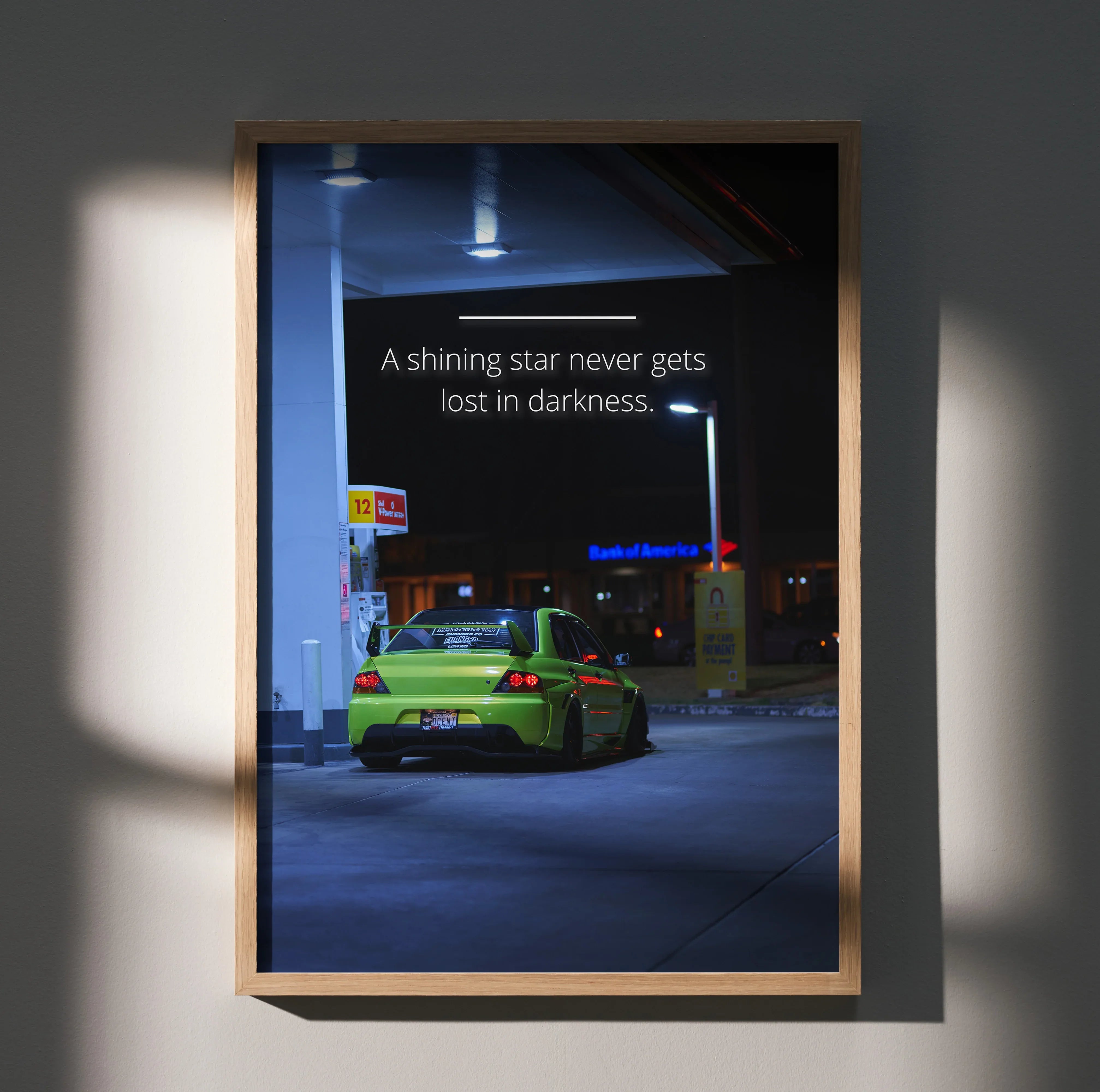 Motivational poster wall art featuring bright green Mitsubishi Evo 9 with inspiring text on dark urban night background.