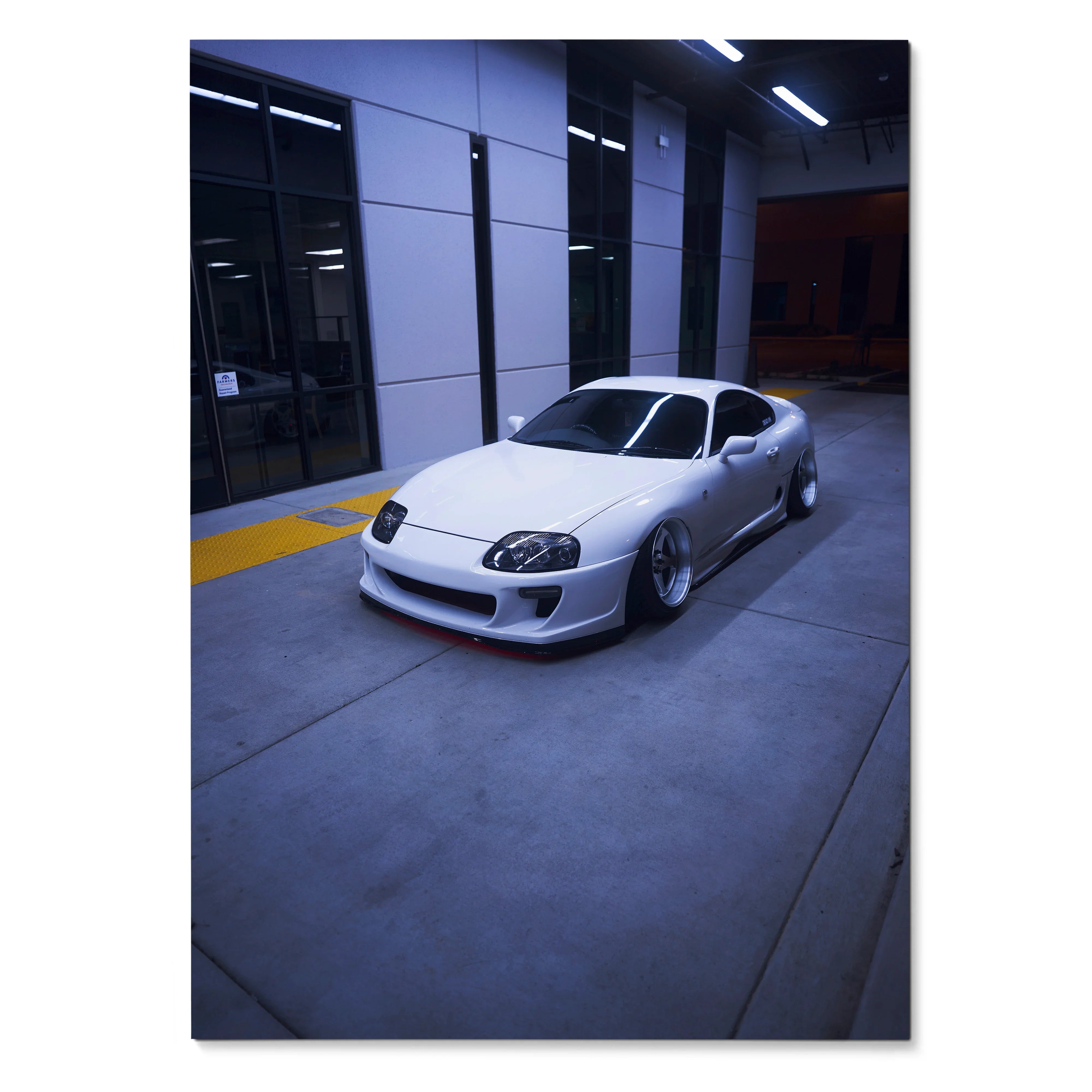 Toyota Supra MK4 white sports car in urban garage setting poster wall art.