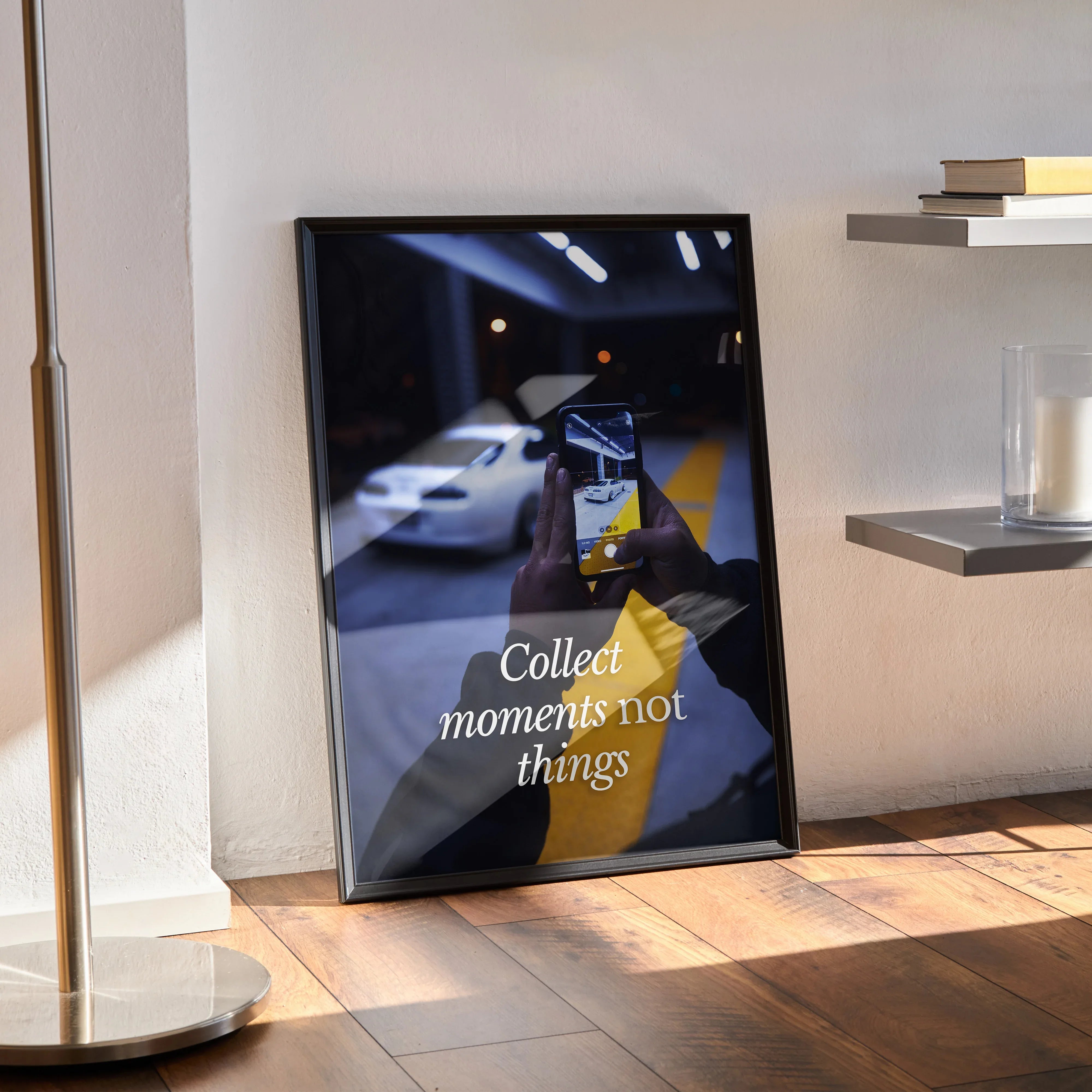 Motivational Toyota Supra Mk4 poster wall art with "Collect moments not things" text in black frame on wooden floor.