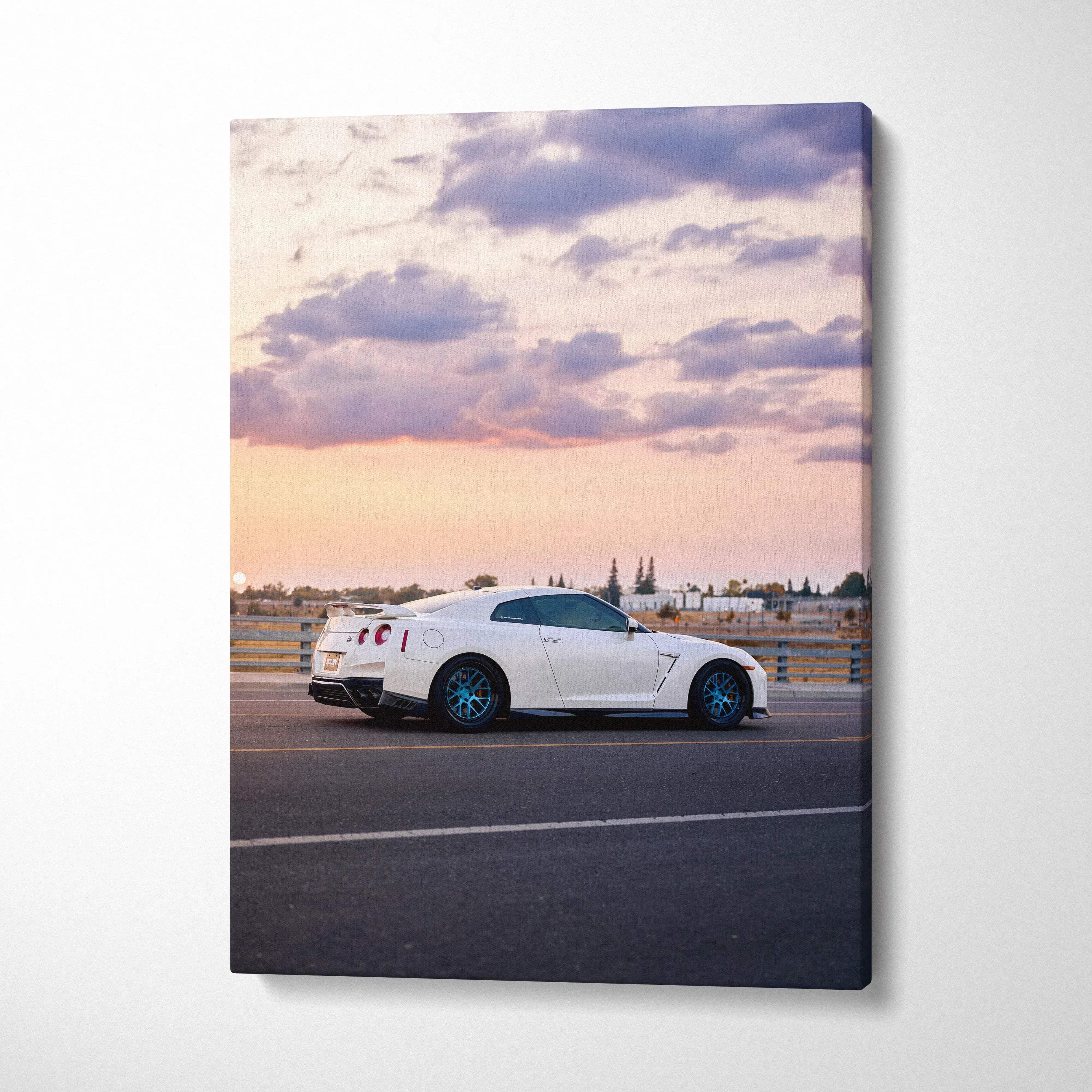 White Nissan R35 GTR parked on road at sunset canvas wall art vertical print.