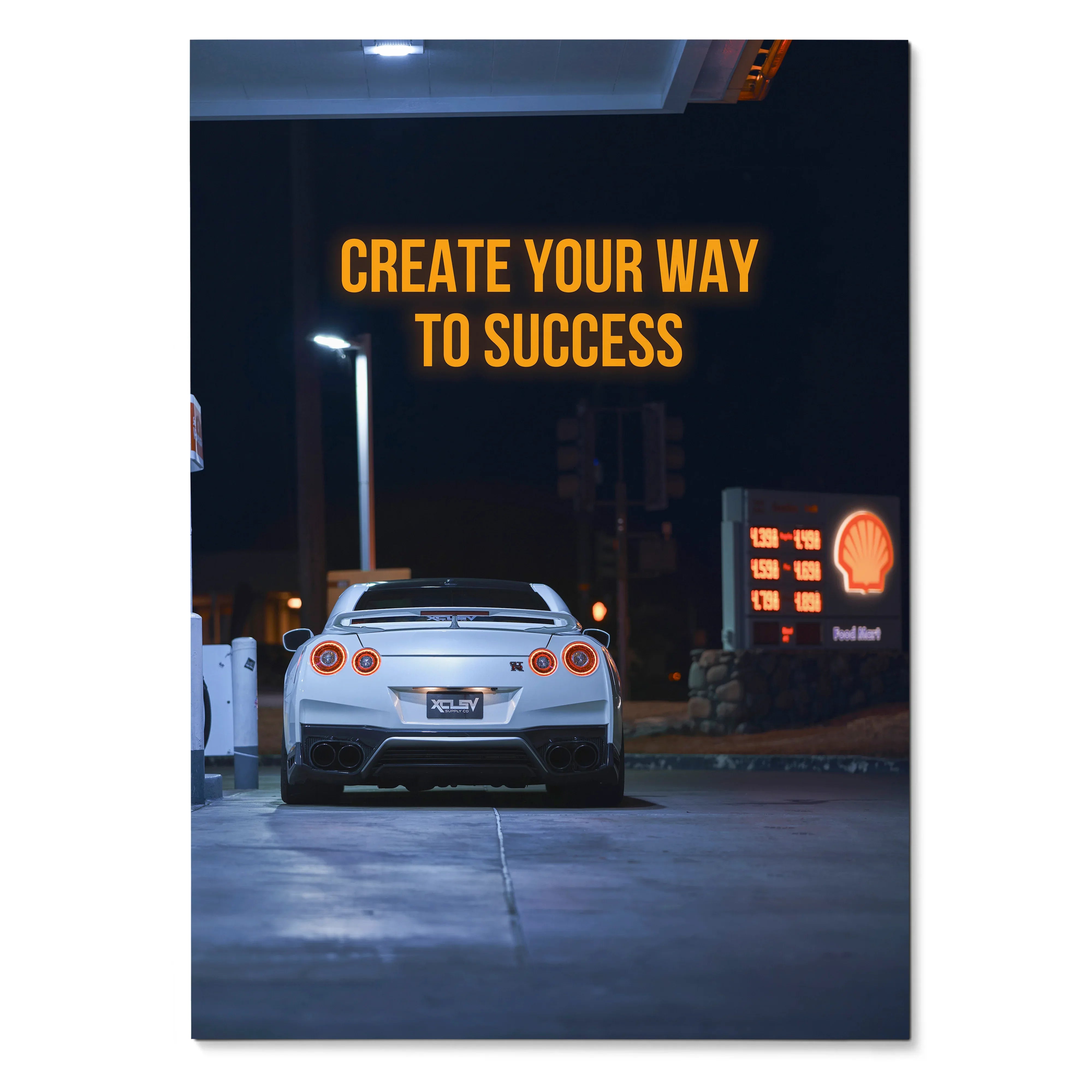 Nissan R35 GT-R rear view at night with "Create Your Way to Success" motivational quote poster wall art.