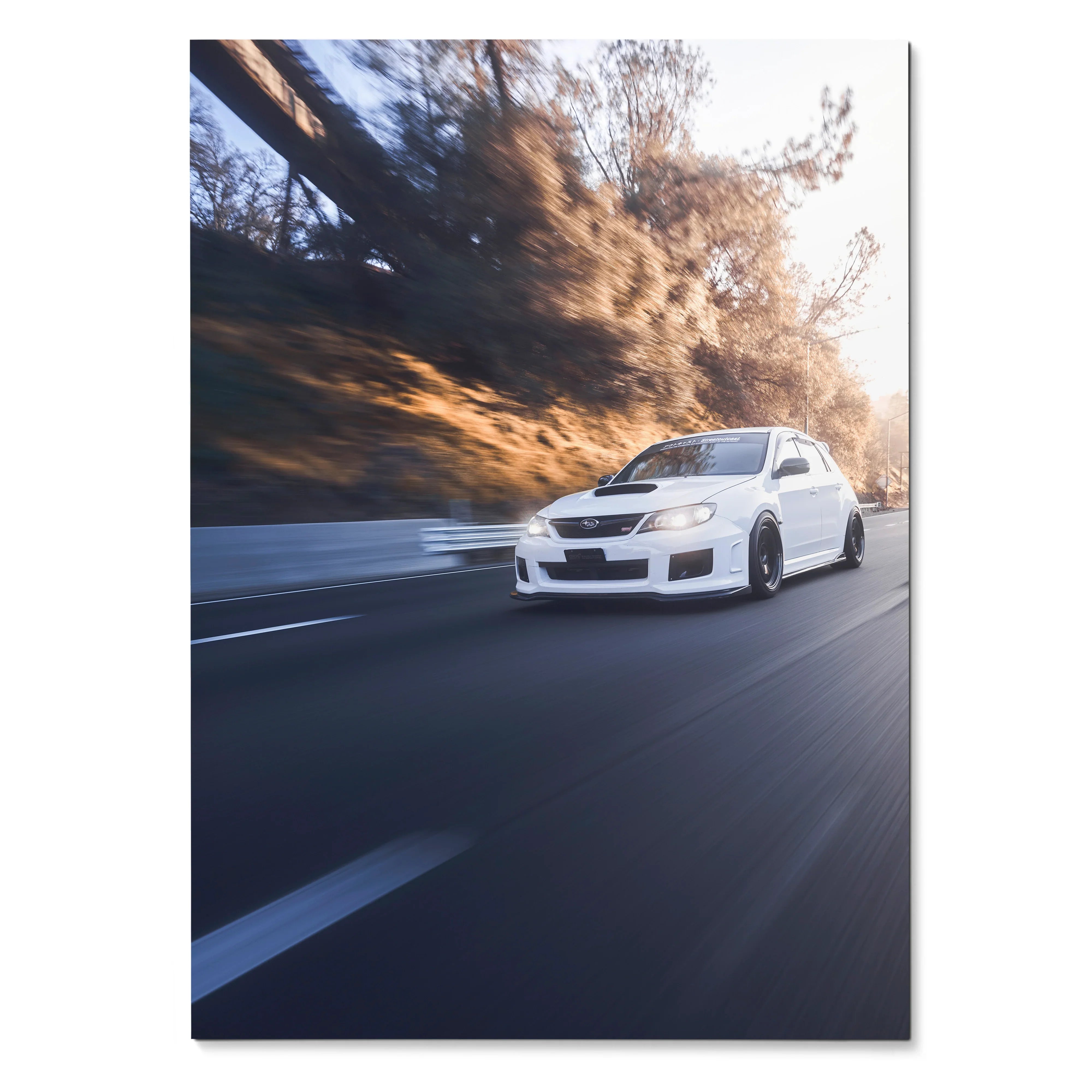 White Subaru WRX STI speeding on road with blurred background in automotive art poster wall art.