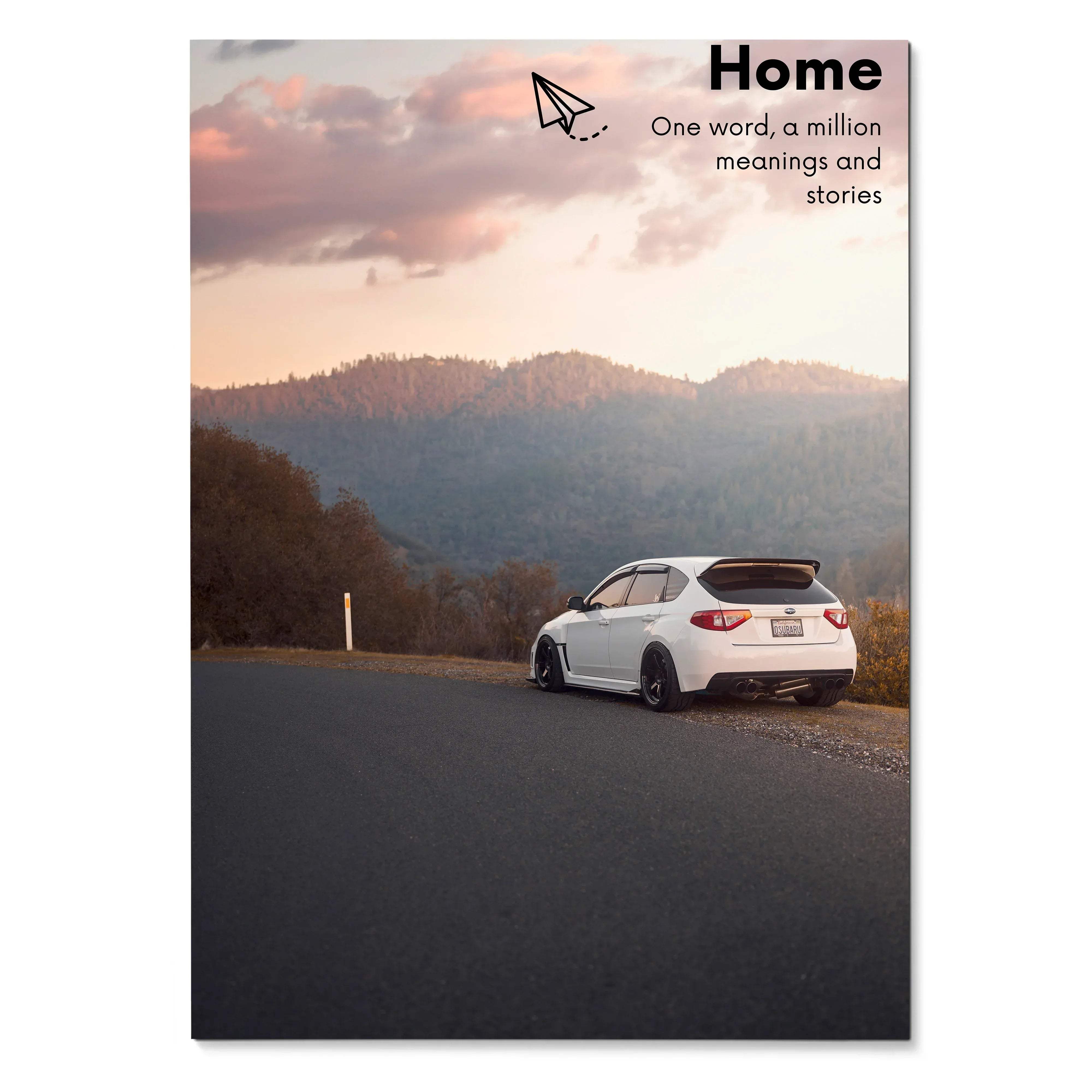 Motivational poster wall art featuring a white Subaru WRX STI parked on a roadside with misty hills and soft pink sunset sky .
