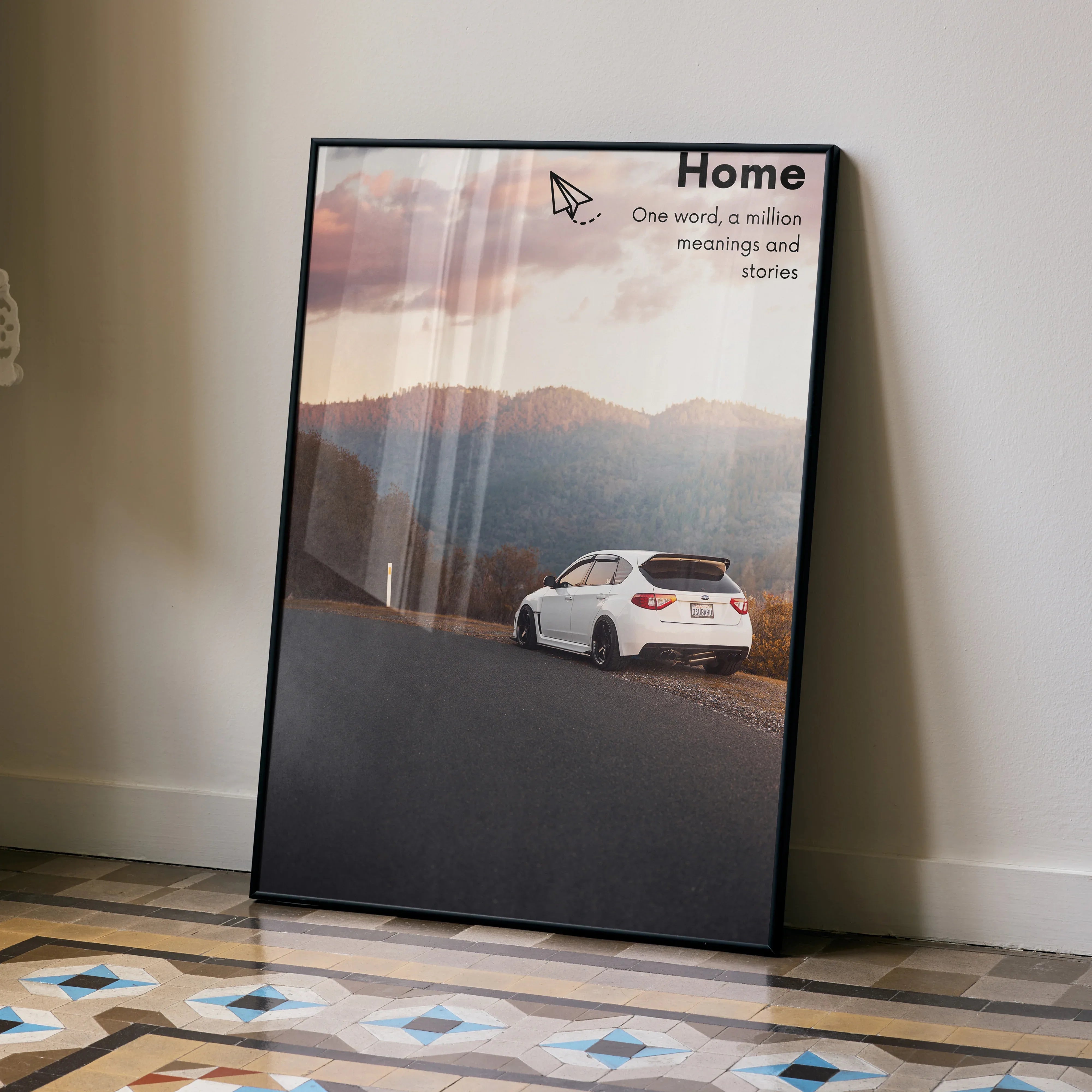 Subaru WRX STI motivational poster with a white car on a mountain road at sunset wall art.