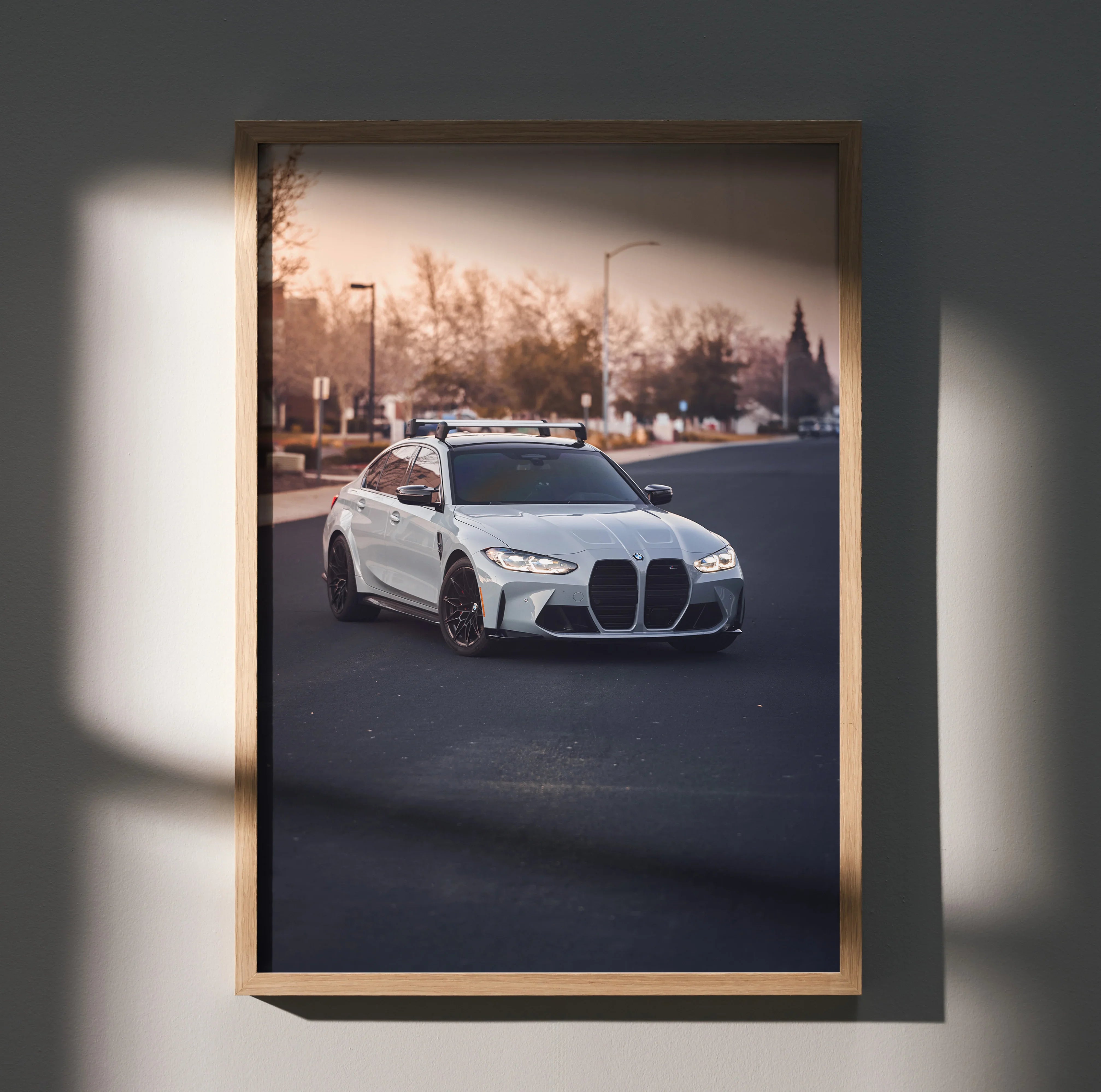 BMW G80 M3 white car poster in wooden frame, luxury wall art for car enthusiasts.