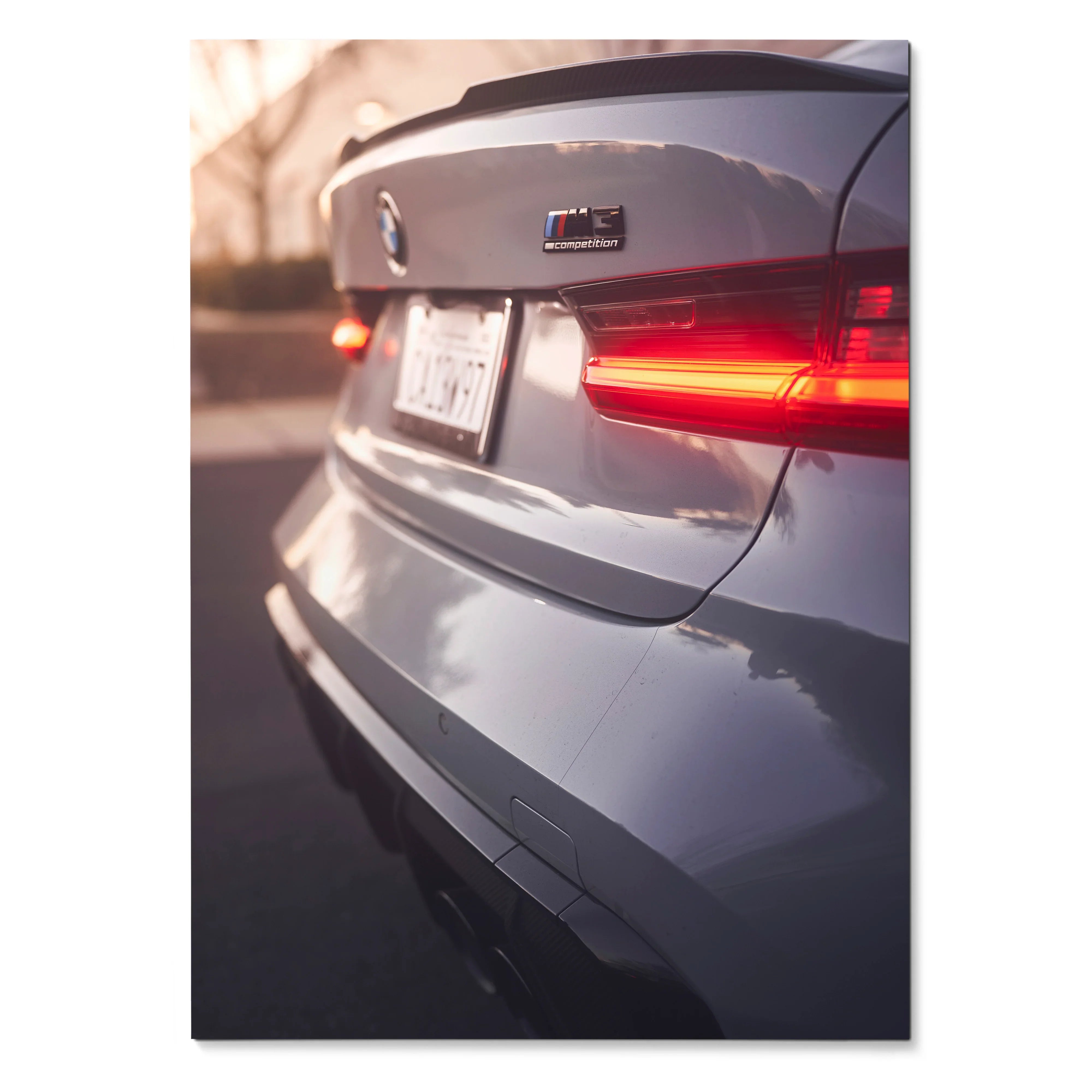 BMW G80 M3 rear close-up with illuminated taillights poster wall art.