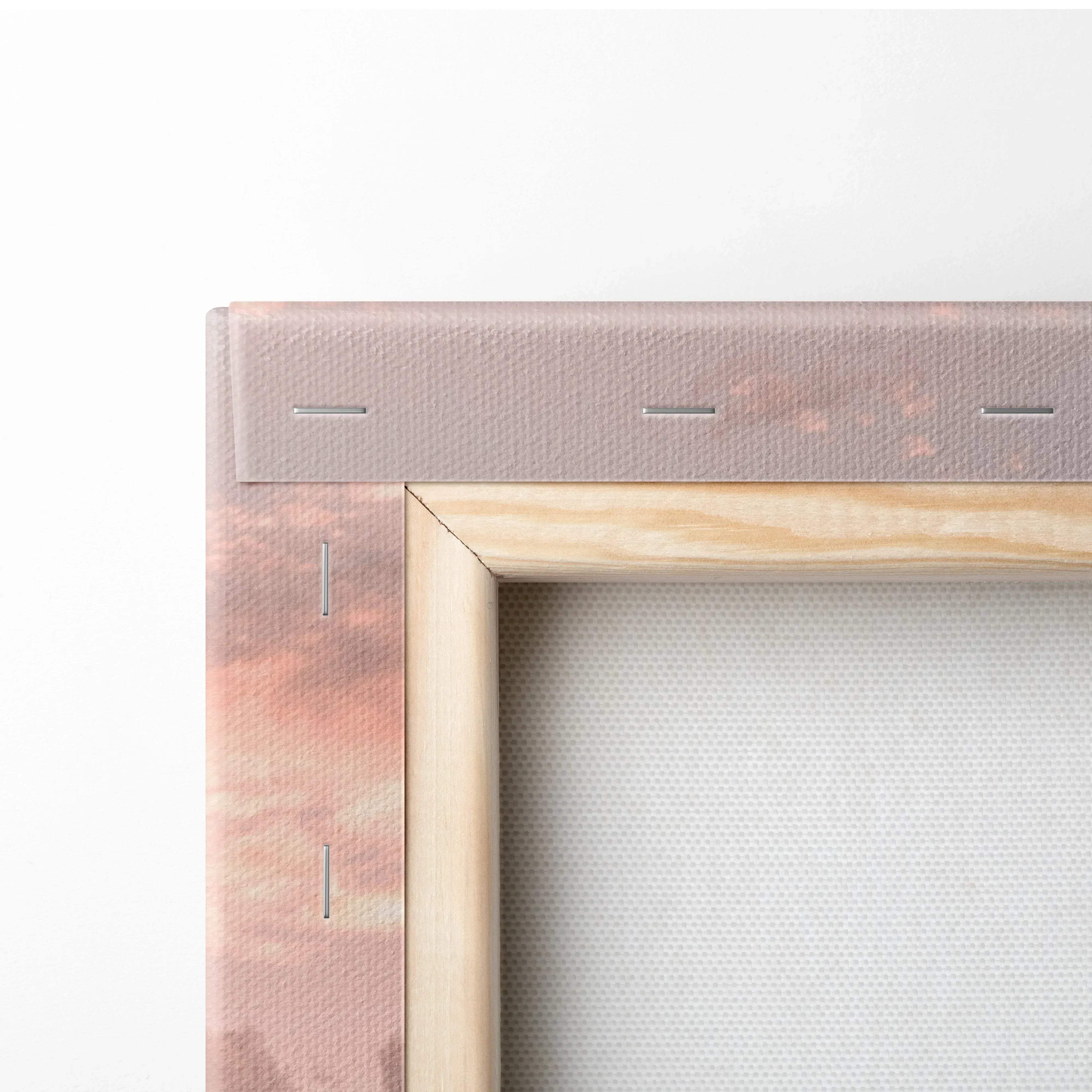 A light pink canvas wall art with a natural wood frame featuring nissan R35 GTR vertical print in sunset mood
