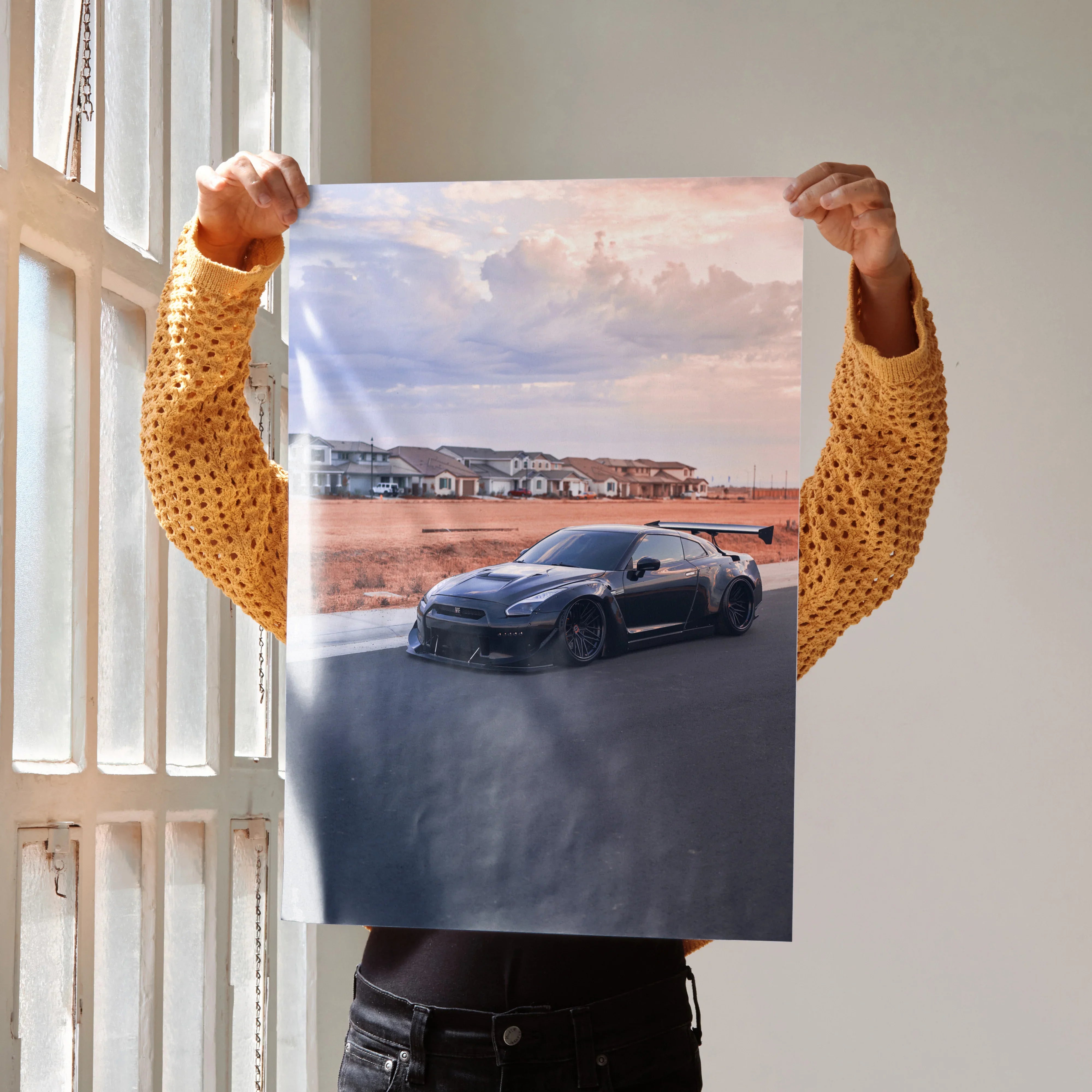 Nissan R35 GTR widebody poster showing dark sports car by sunset, automotive wall art.