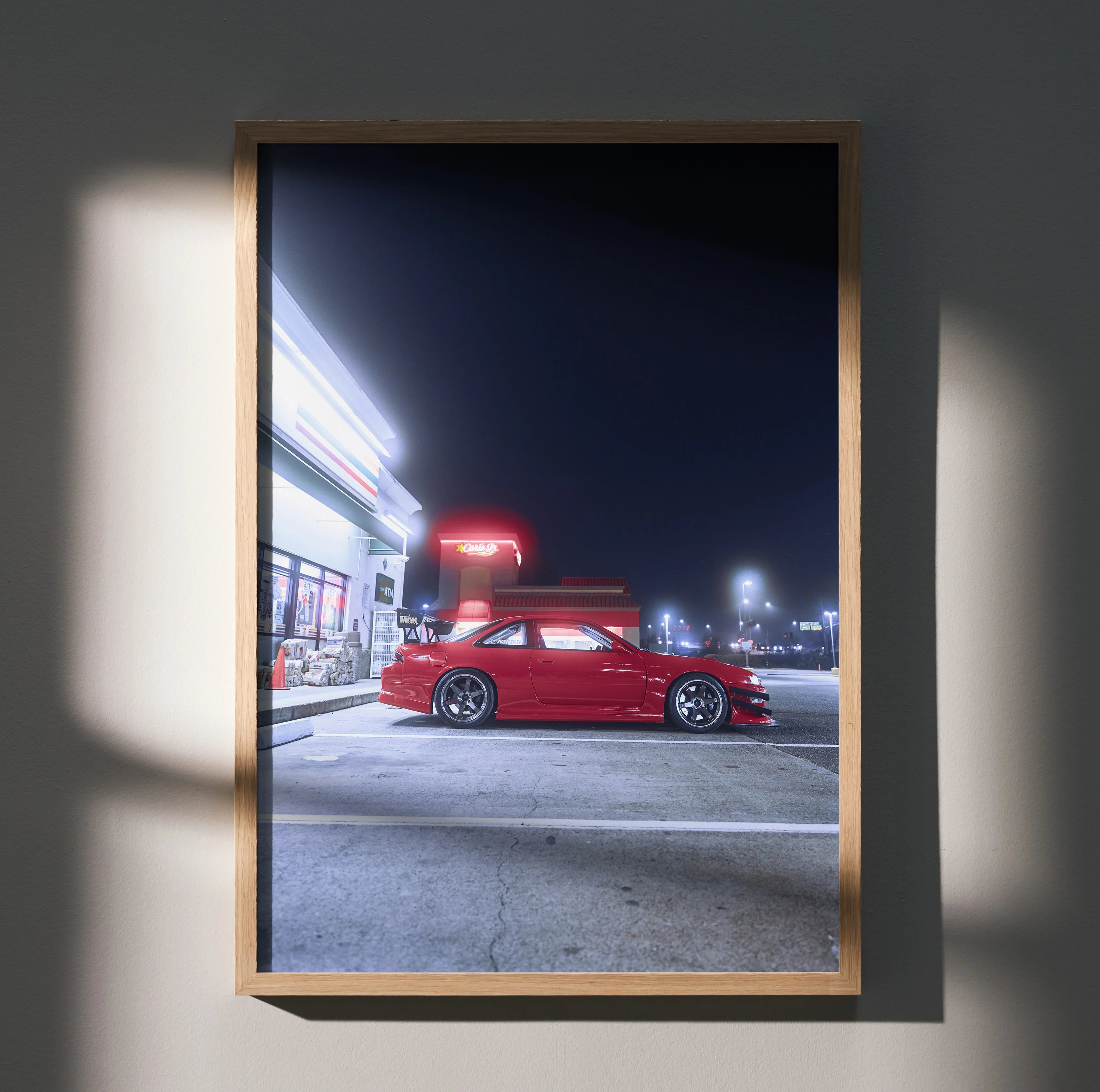 Nissan 240sx S14 Kouki in red parked at night lit gas station poster wall art.