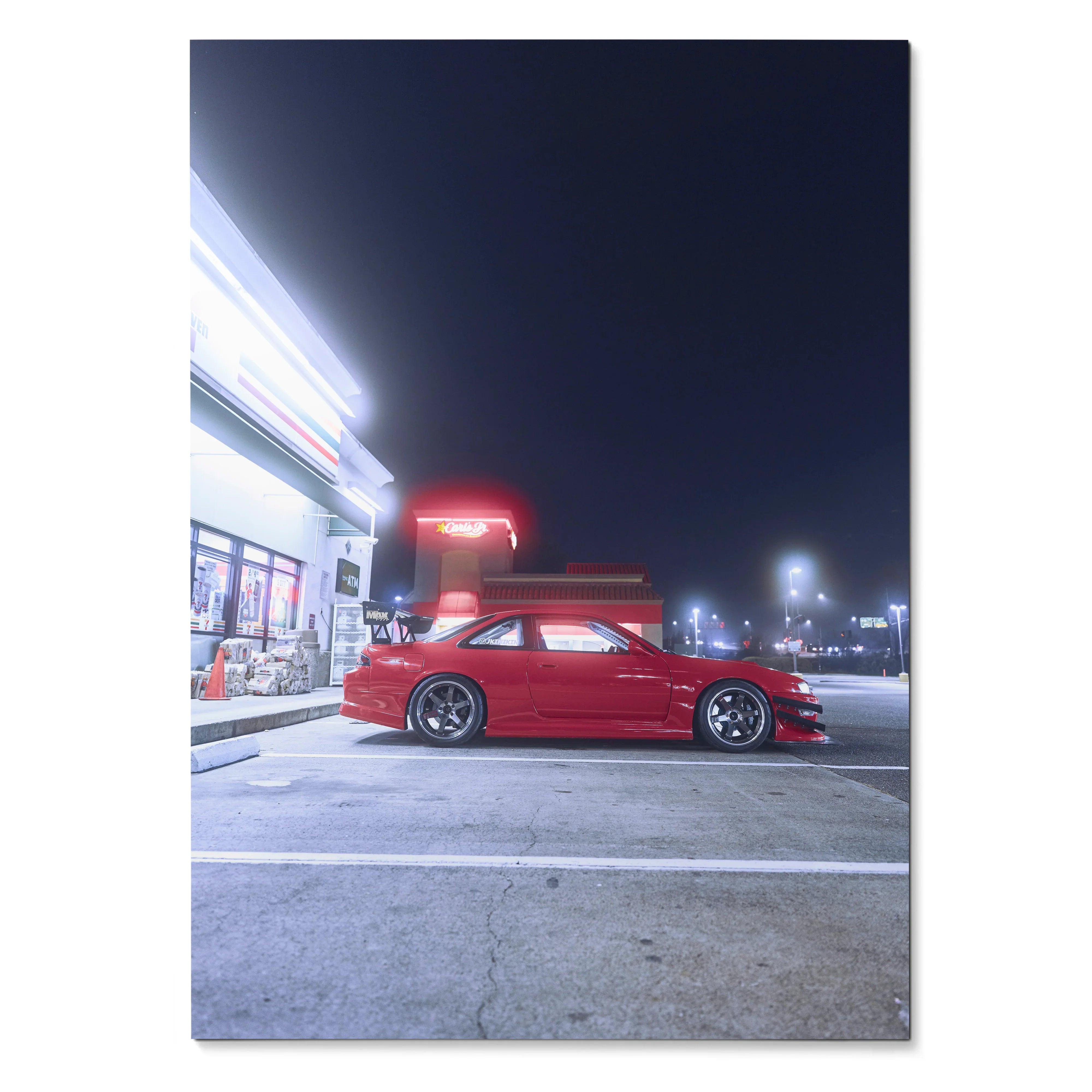 Red Nissan 240sx S14 Kouki parked at night with glowing taillights poster wall art.