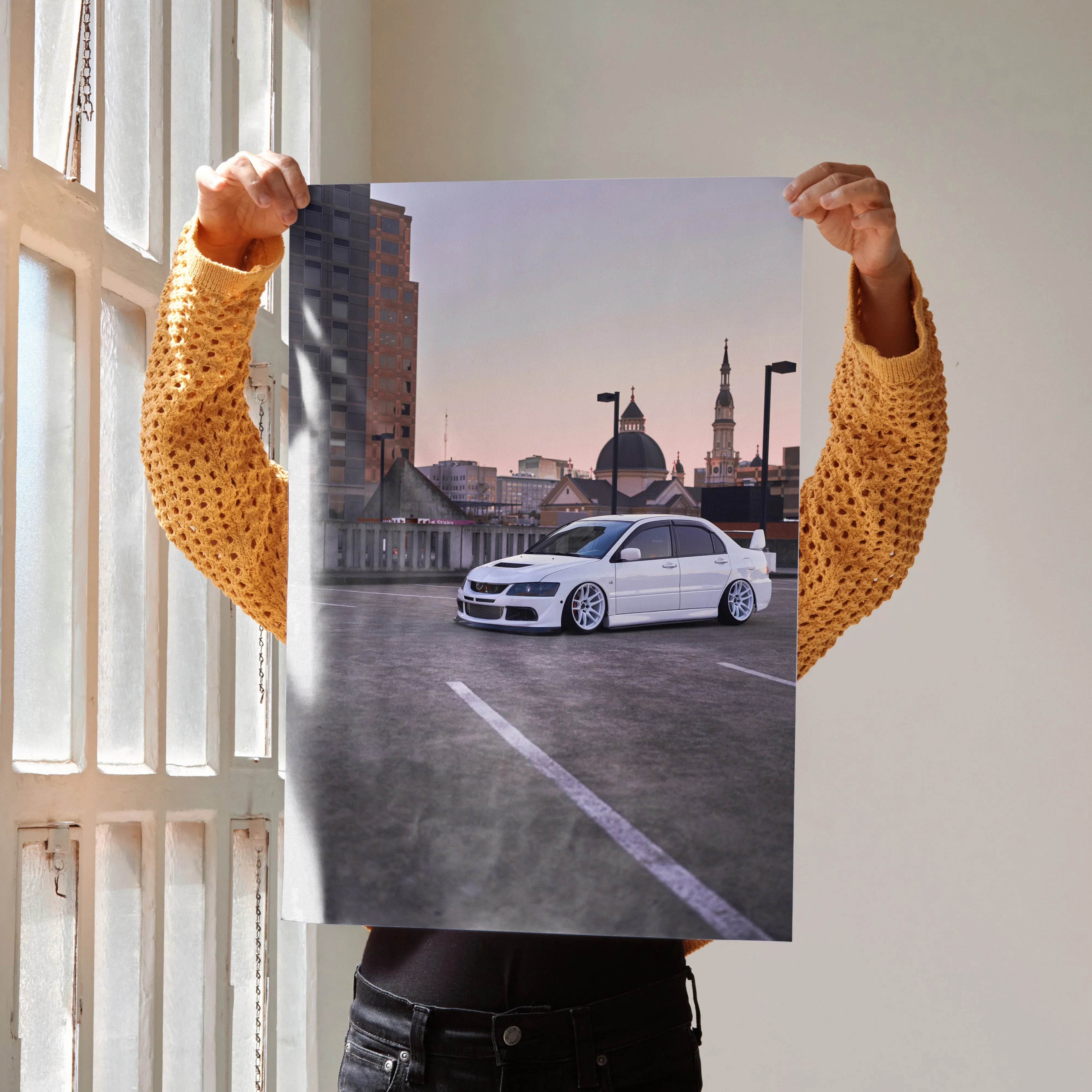 Mitsubishi Evo 8 poster wall art with white car in urban rooftop setting at sunset.