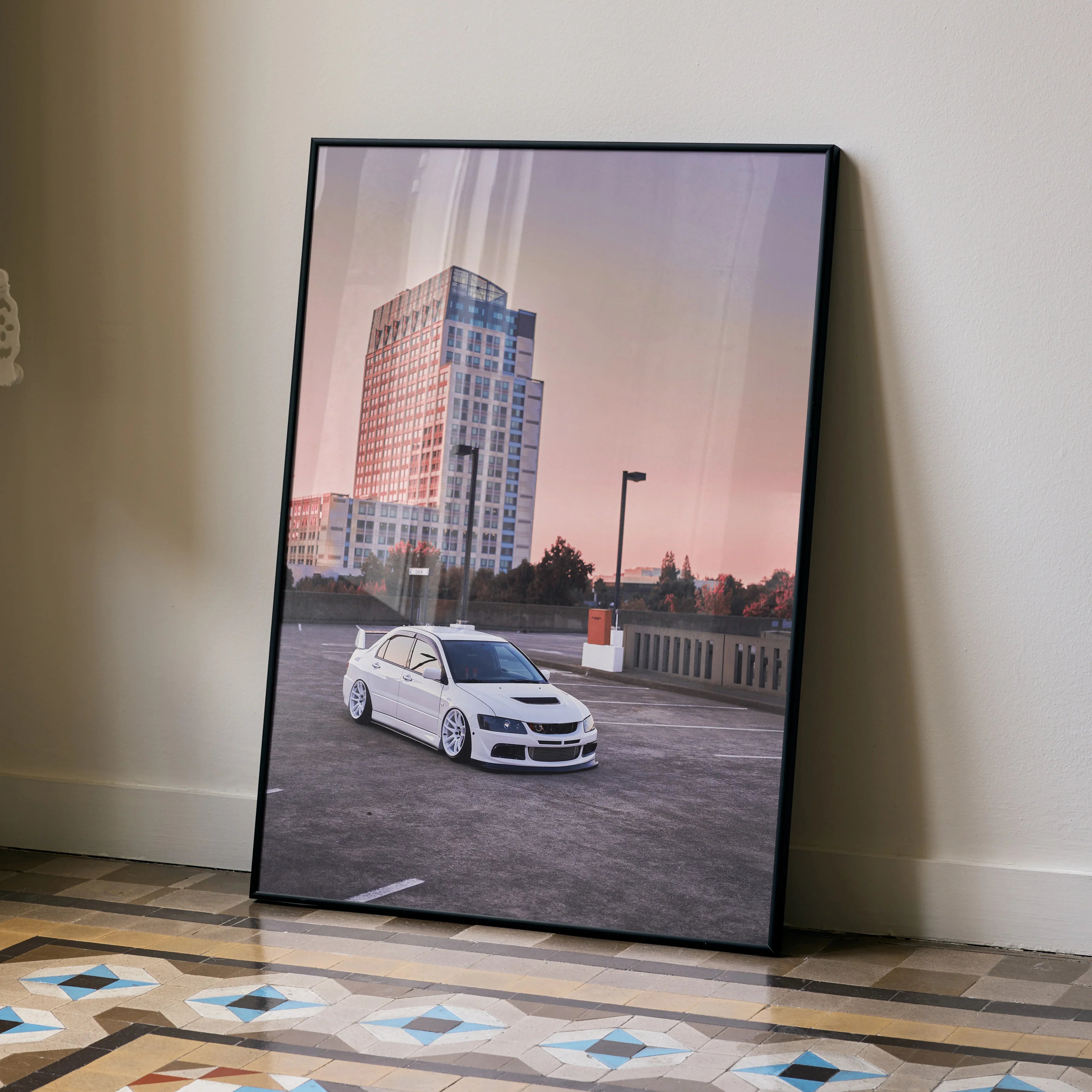 Mitsubishi Evo 8 white sports car poster leaning on wall with urban sunset background wall art.