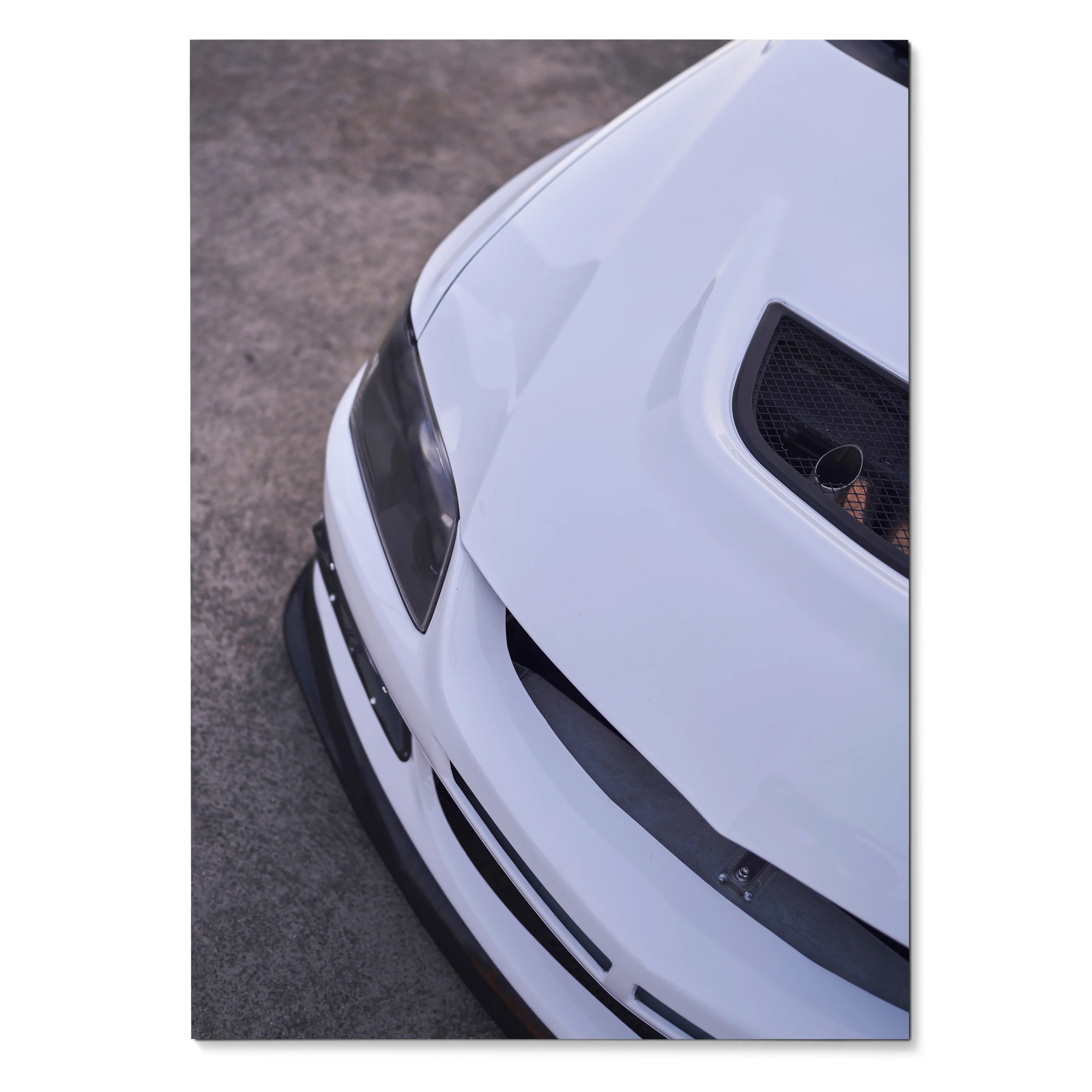 White Mitsubishi Evo 8 front close-up poster showcasing hood scoop and sleek headlights wall art.