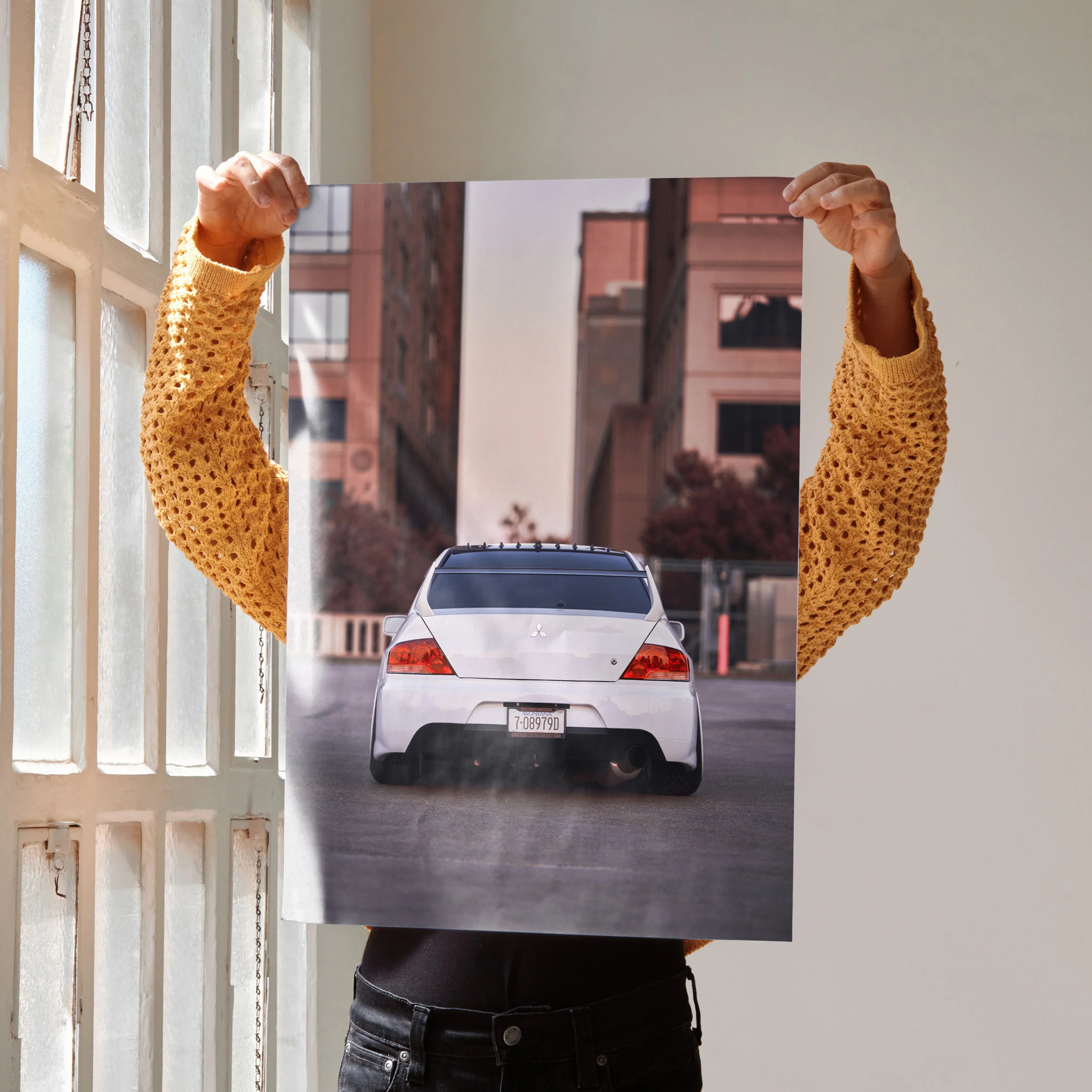 Mitsubishi Evo 8 rear view poster with urban background wall art in vibrant colors.