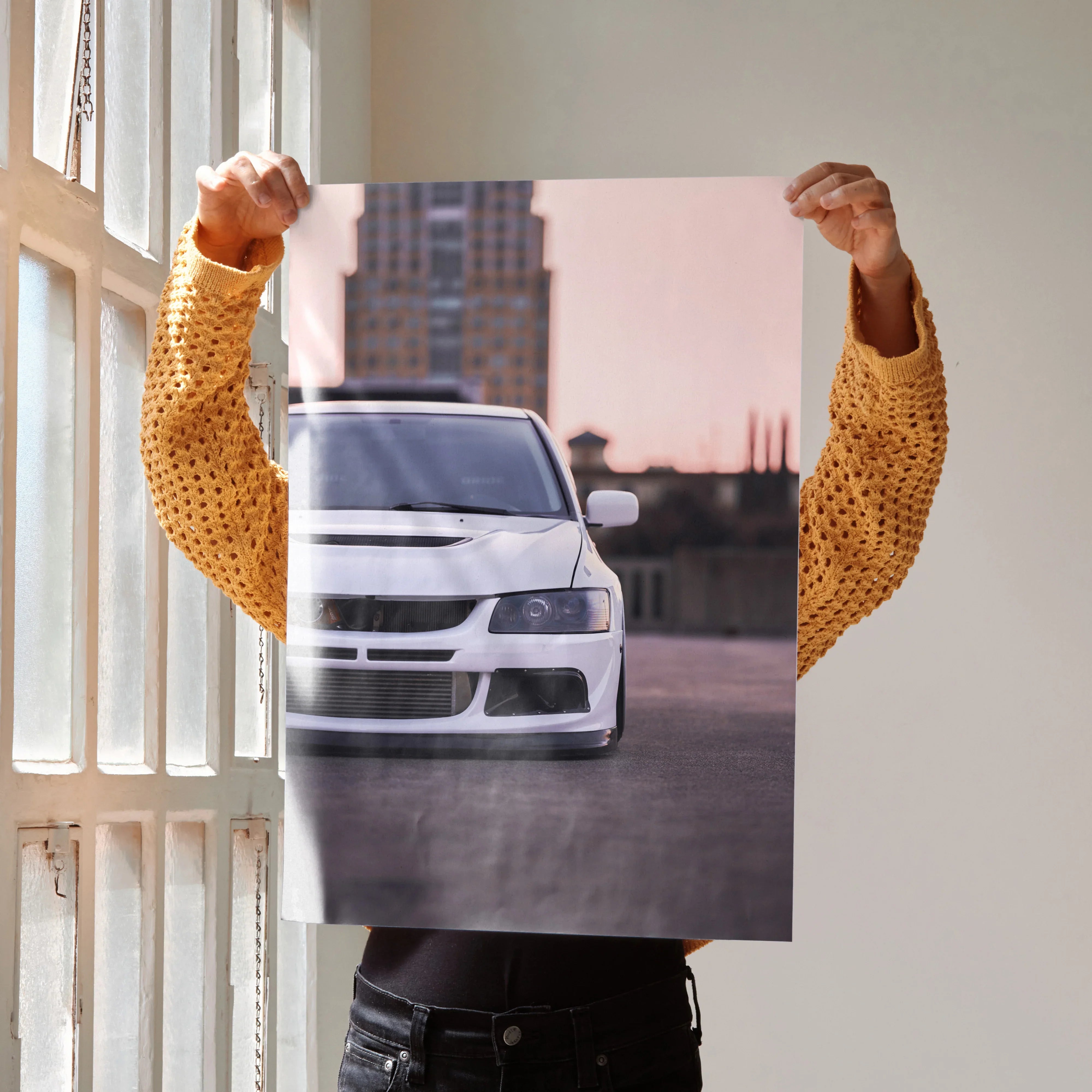 White Mitsubishi Evo 8 front view poster with urban background, high-resolution wall art.