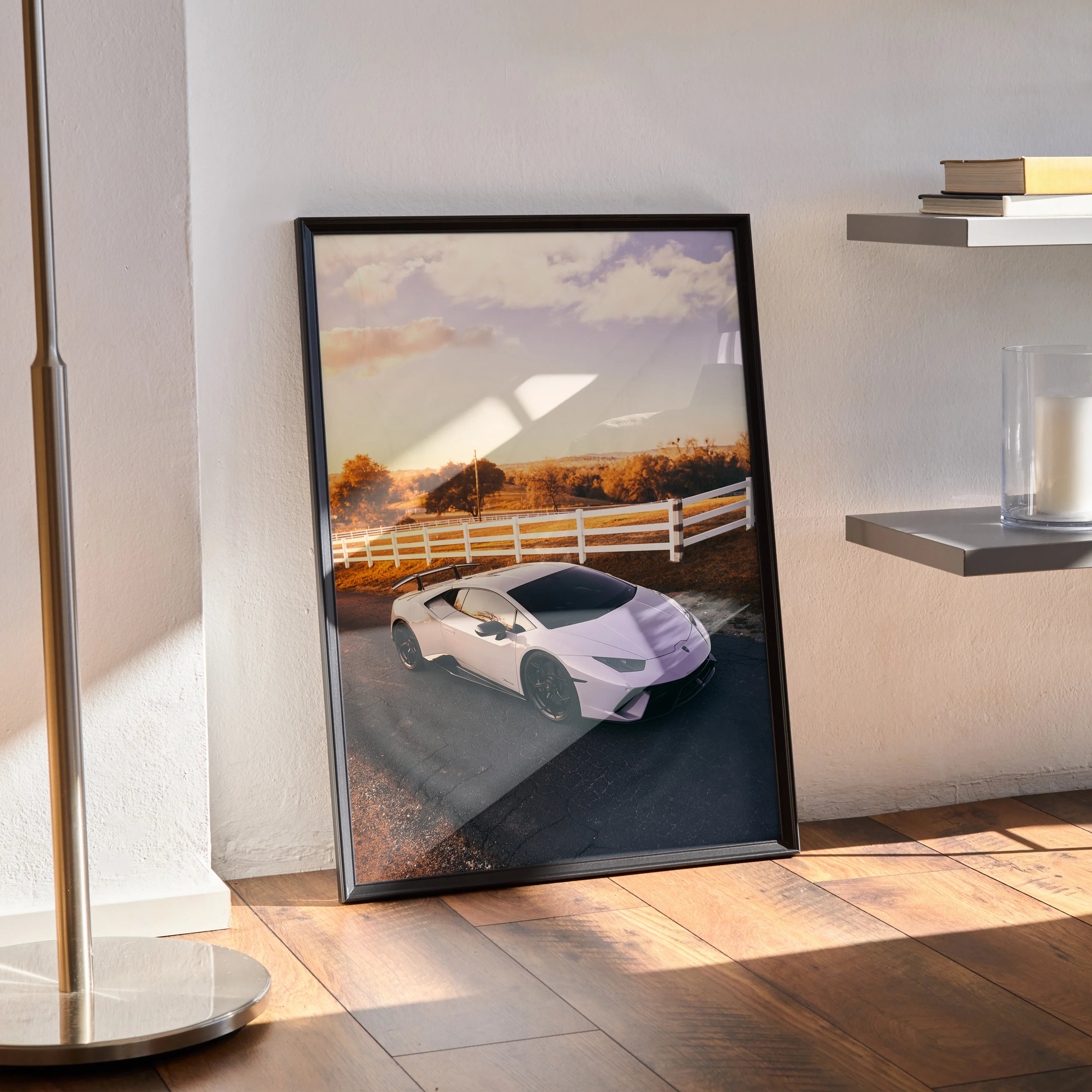 Lamborghini Huracan poster with white sports car on a scenic rural road, wall art in black frame.
