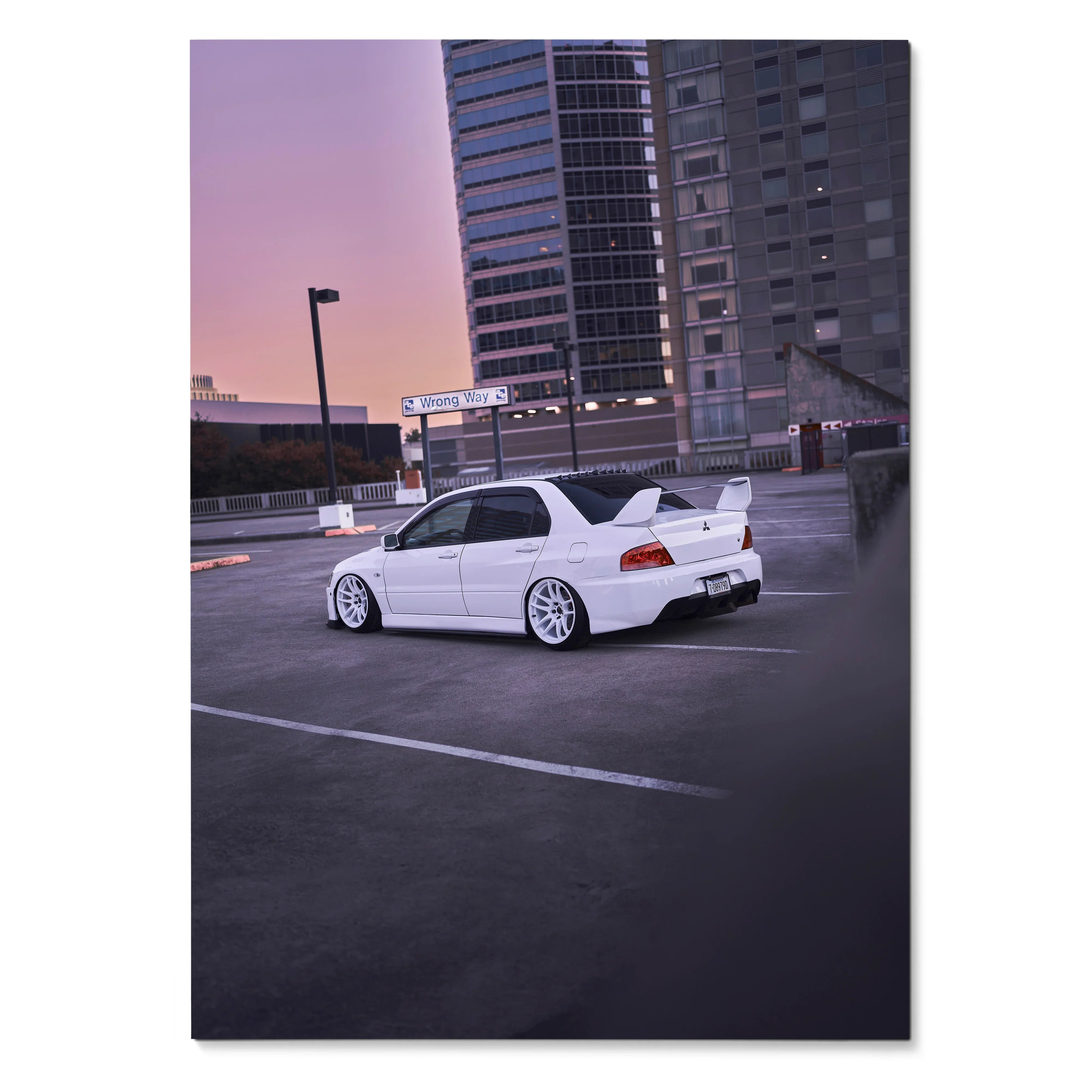 White Mitsubishi Evo 8 parked on rooftop at sunset poster, urban car wall art.